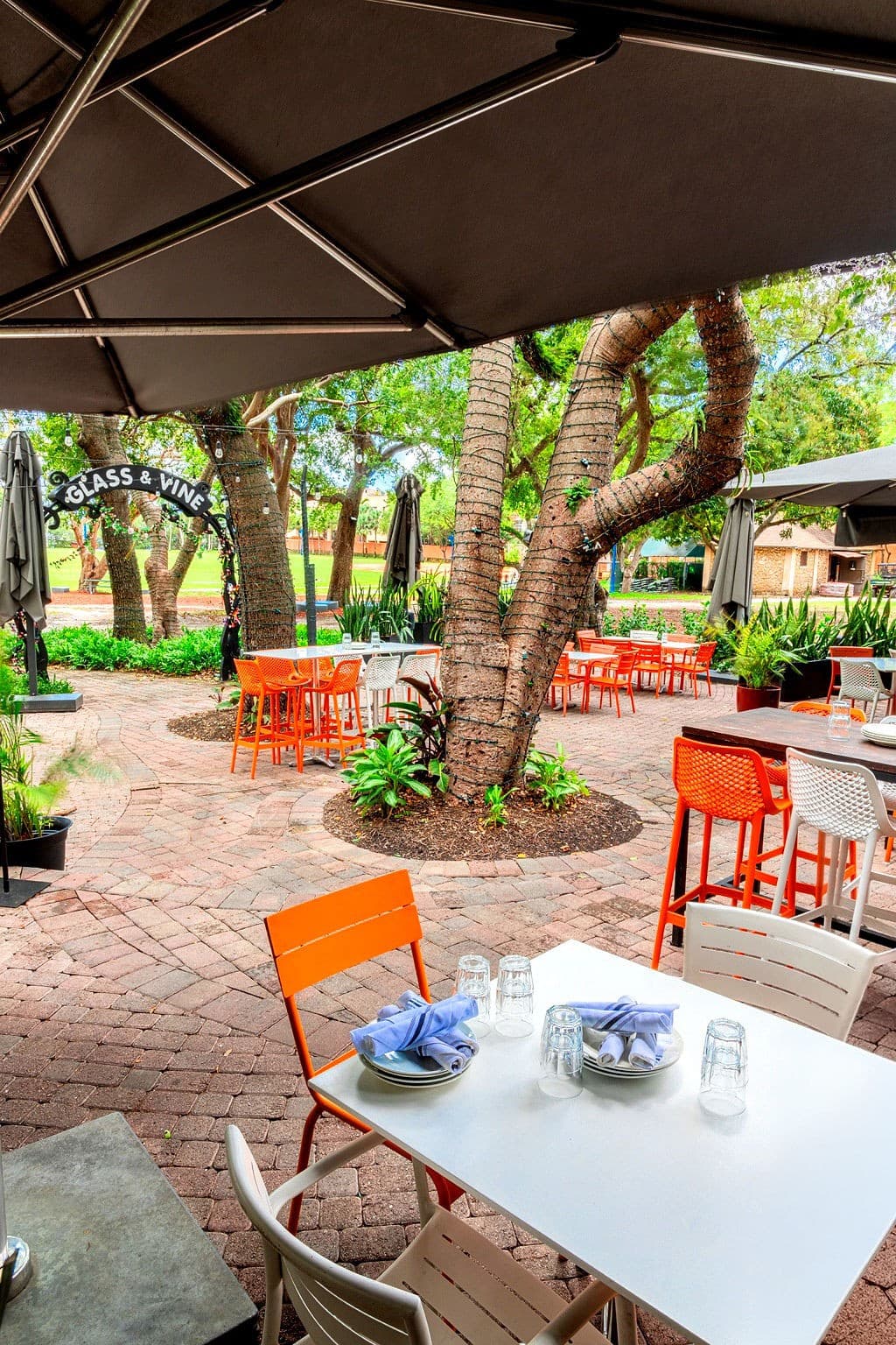 Outdoor patio seating at Glass & Vine in Miami