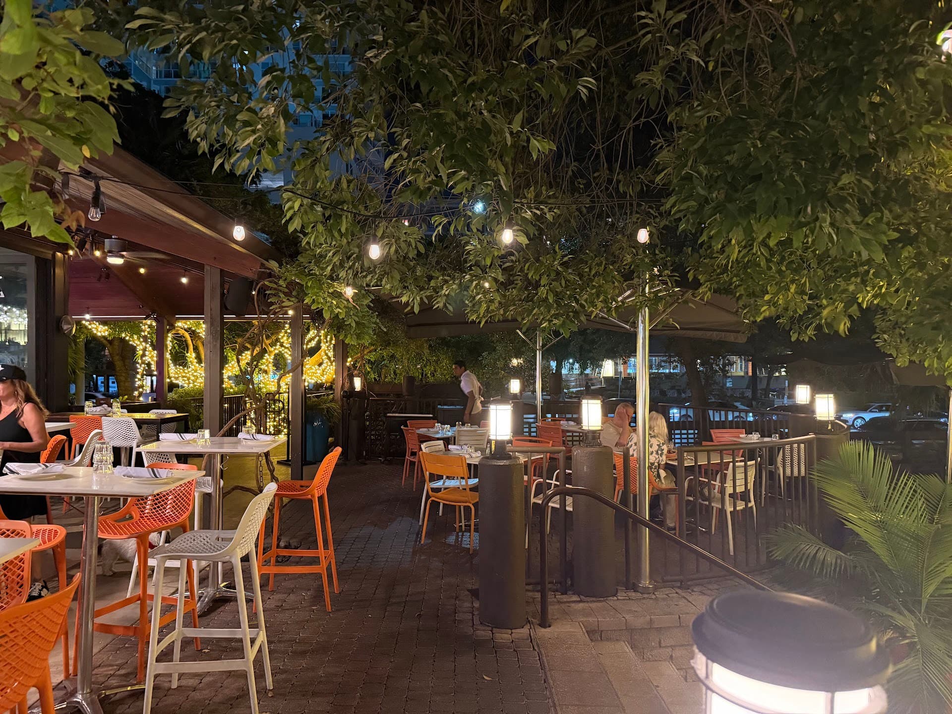 Outdoor dining area at Glass & Vine in Miami