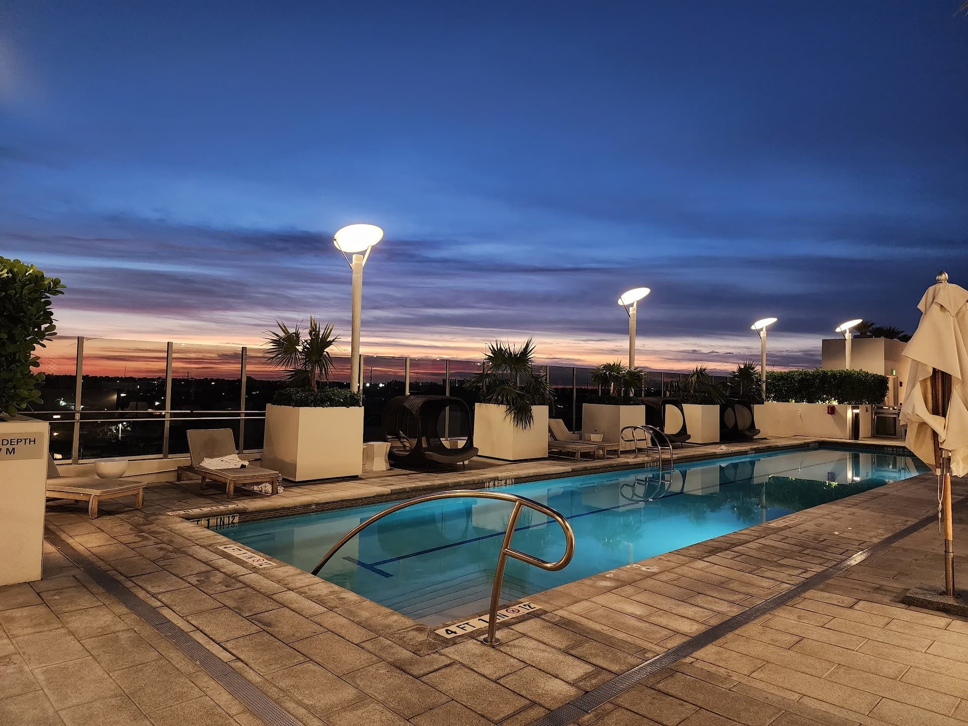 Pool view at Hilton Miami Aventura during sunset