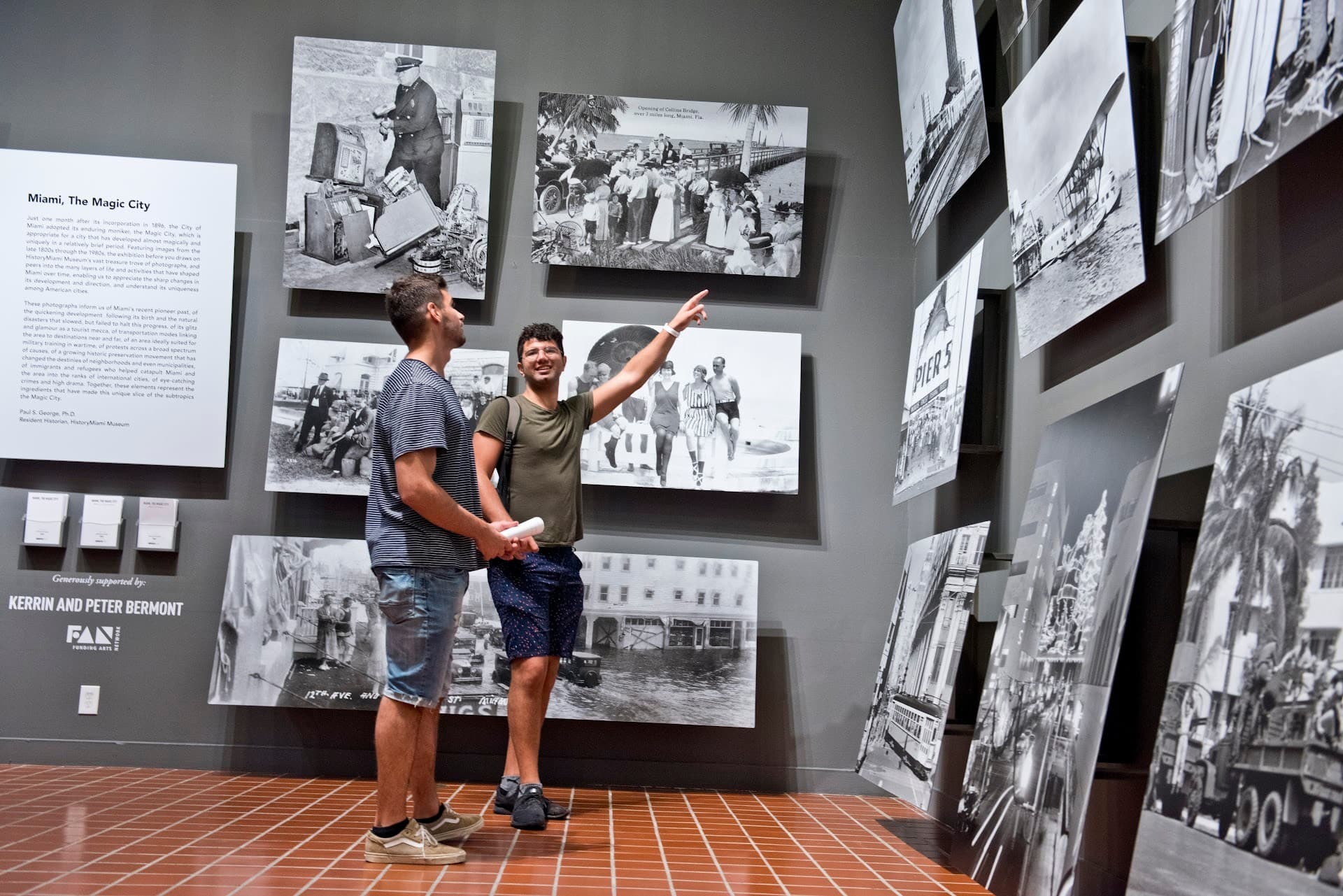 Visitors explore HistoryMiami Museum exhibits in Miami