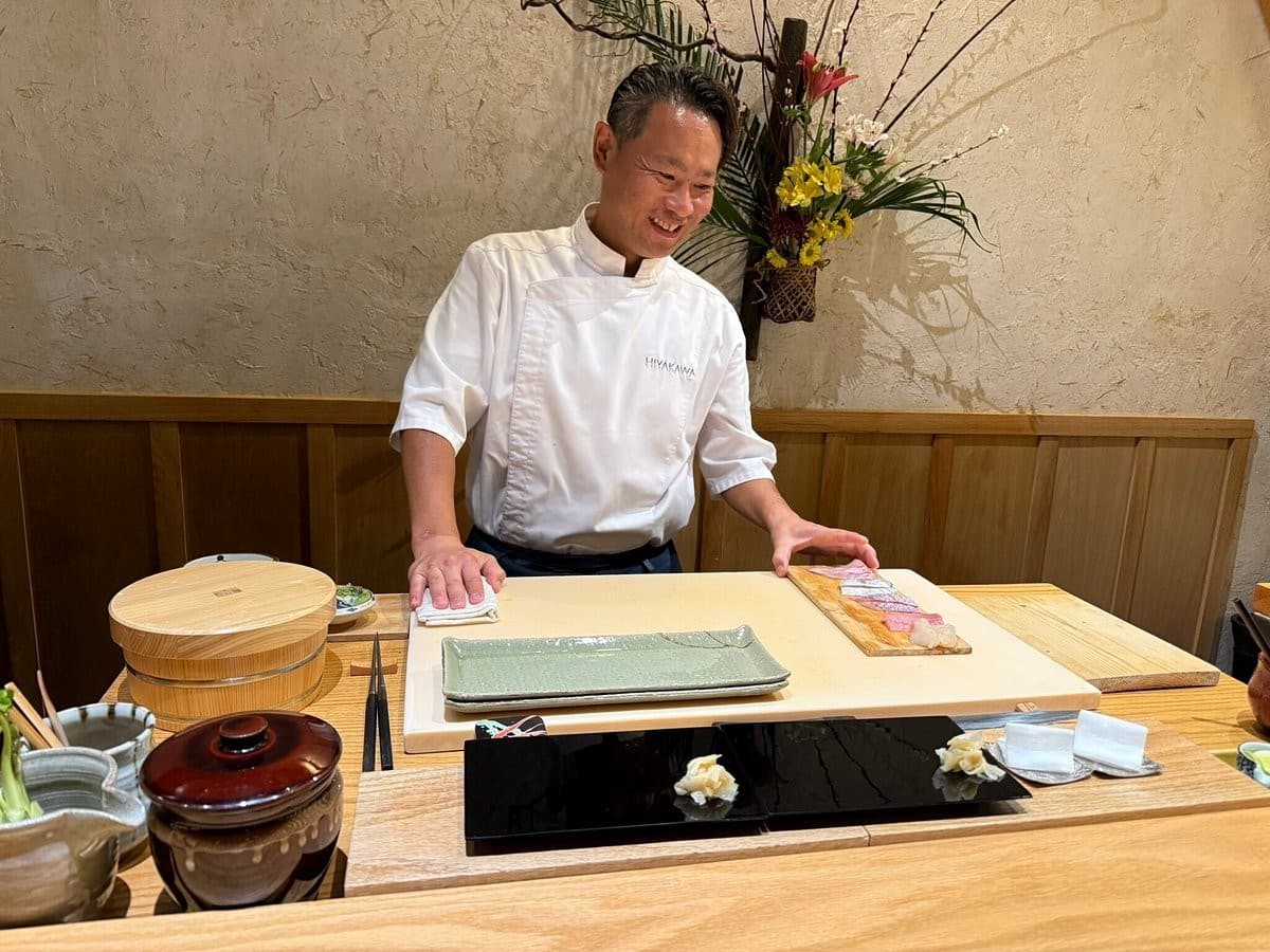 Chef preparing food at Hiyakawa Miami restaurant