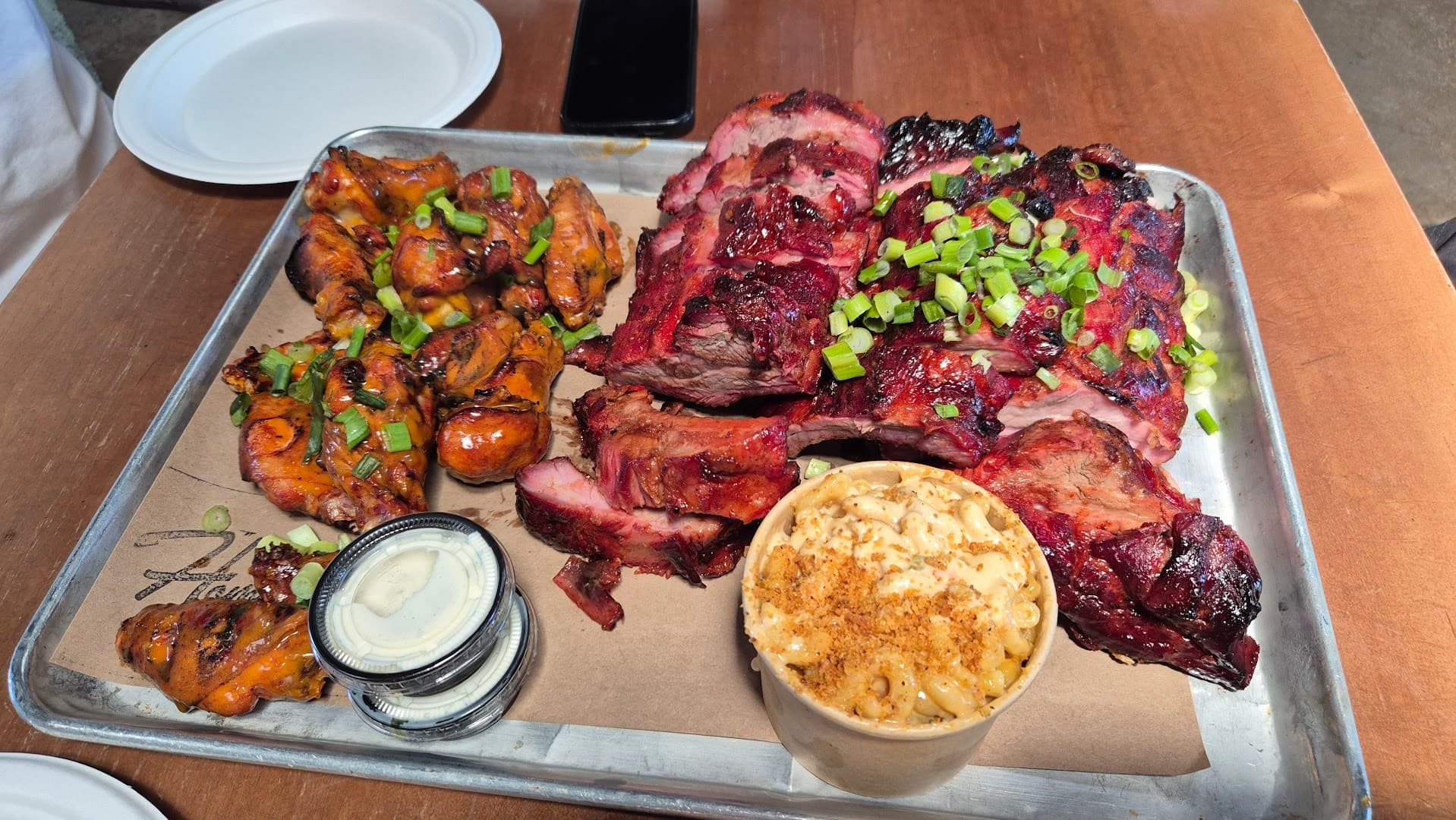 Hometown Barbecue platter with ribs and wings in Miami