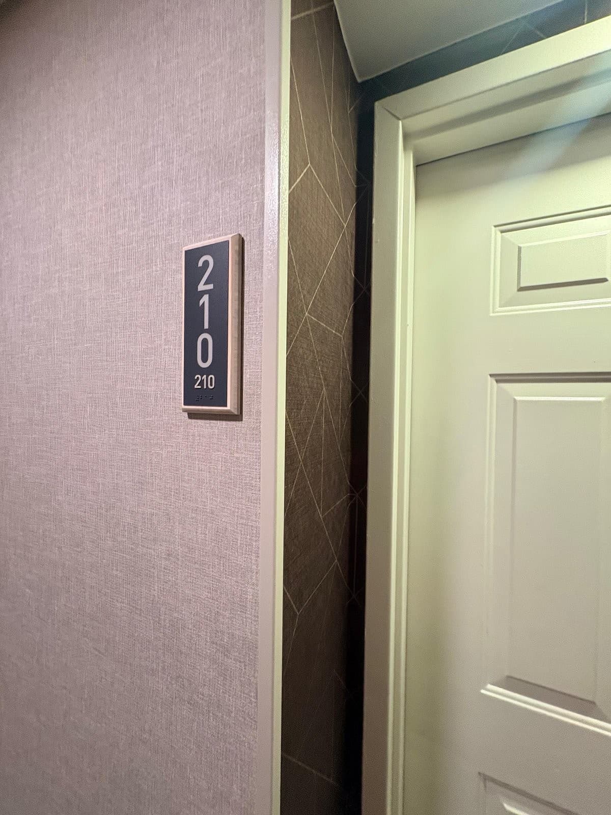 Room number signage at Homewood Suites by Hilton Miami