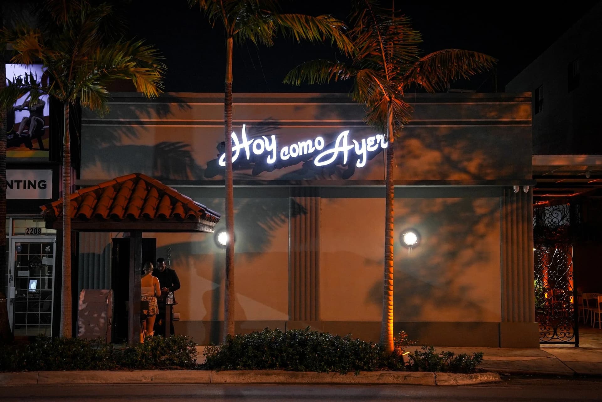 Hoy Como Ayer exterior sign in Miami at night