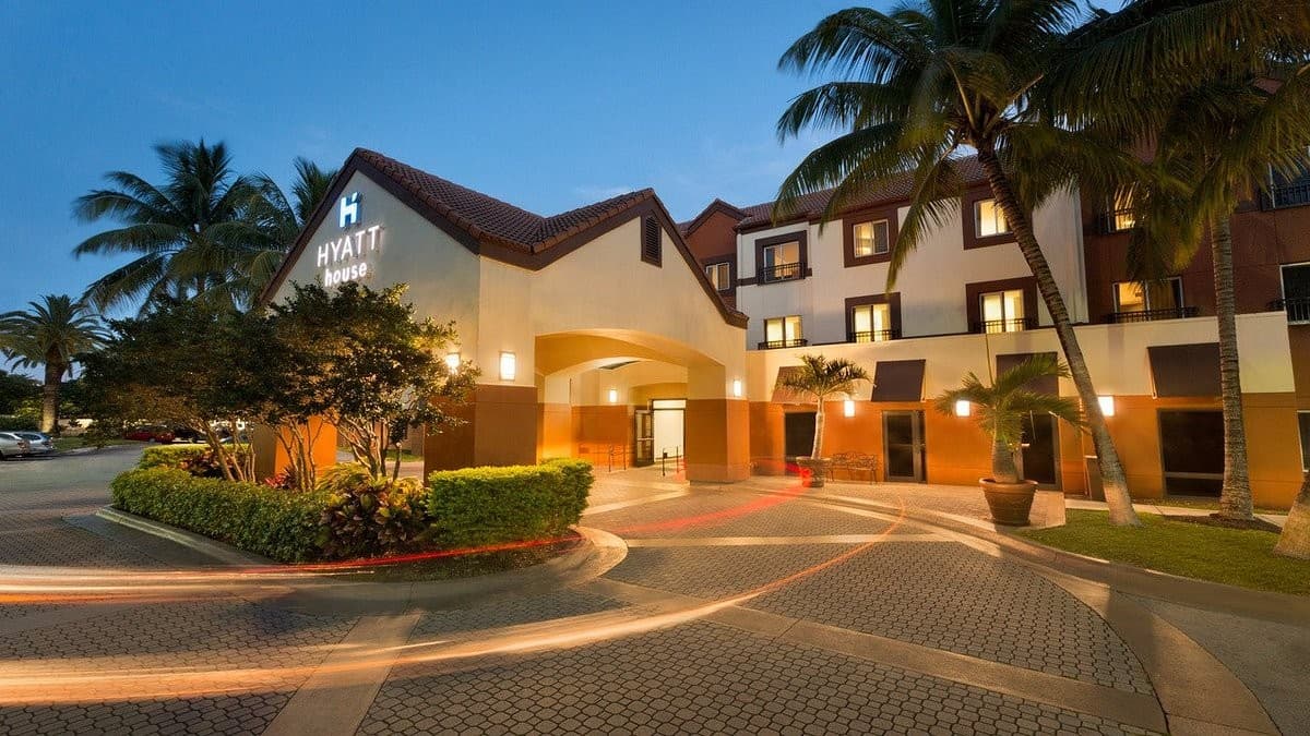 Hyatt House Miami Airport hotel entrance at dusk
