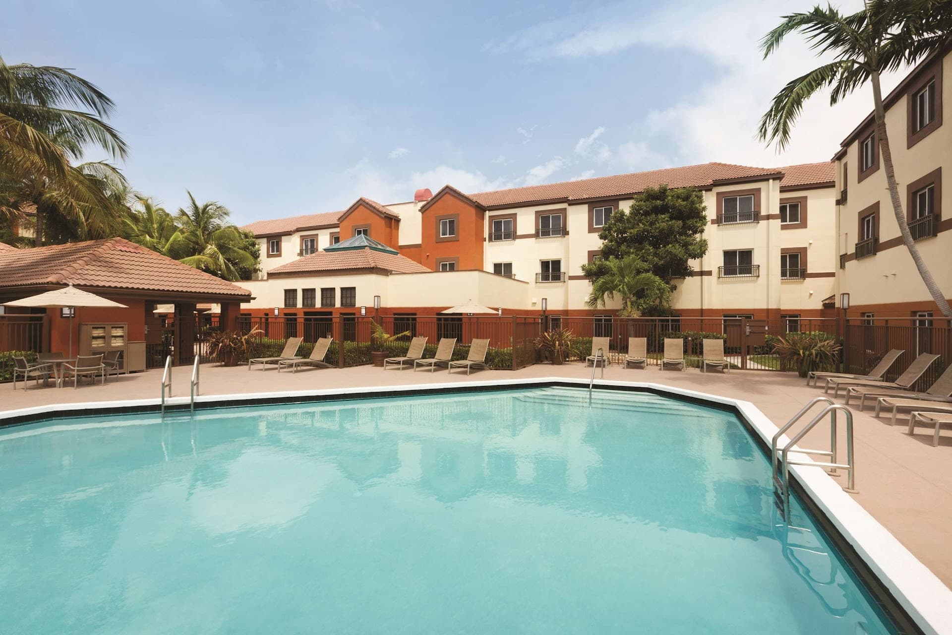 Hyatt House Miami Airport pool area and hotel