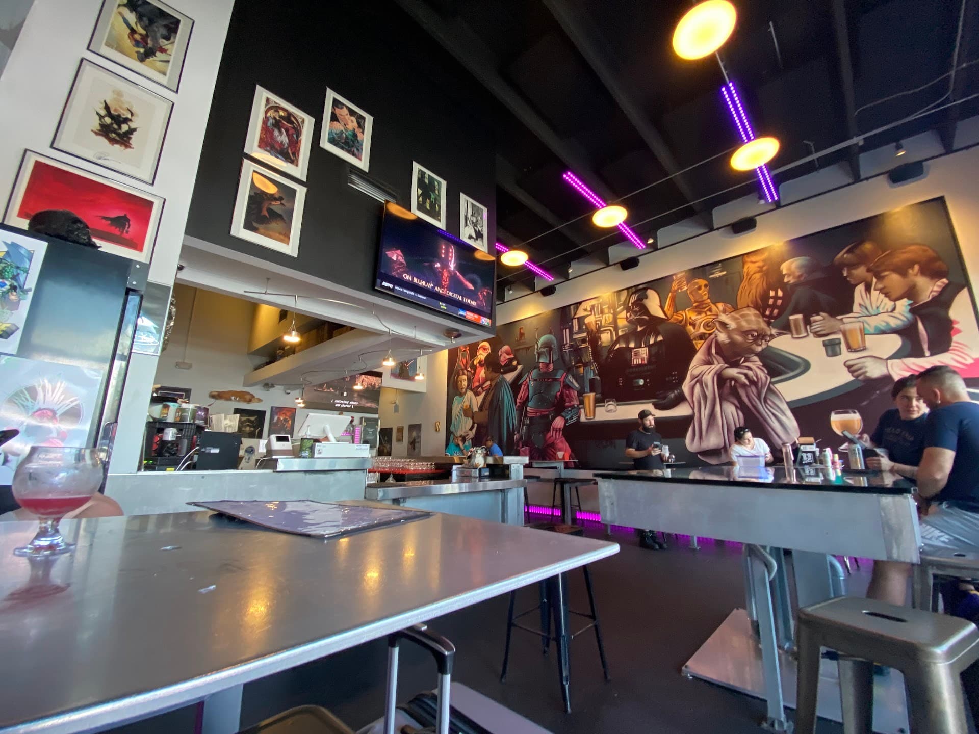 Interior view of J Wakefield Brewing in Miami with vibrant art