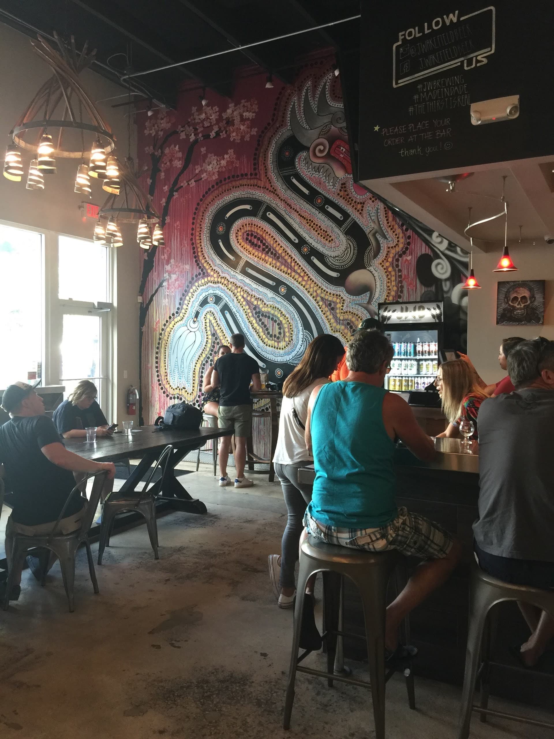Vibrant interior at J Wakefield Brewing in Miami