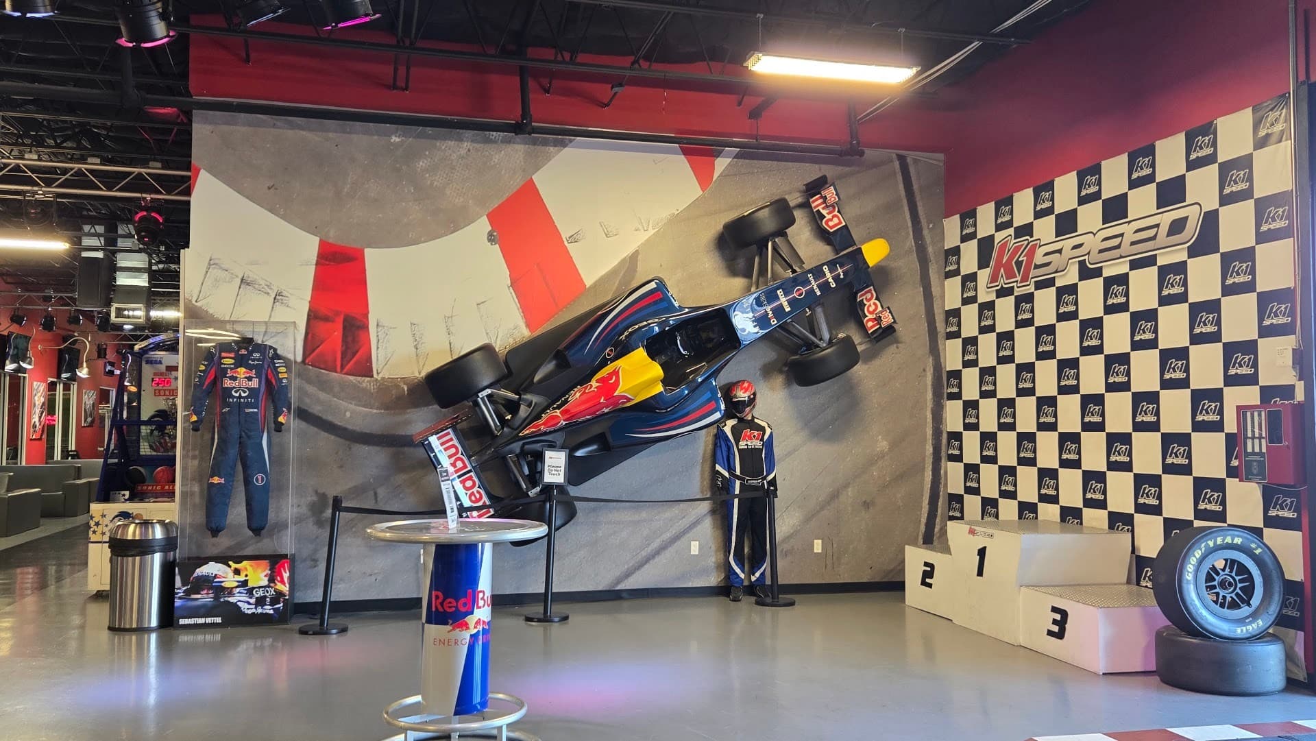 K1 Speed Miami interior with racing car decor