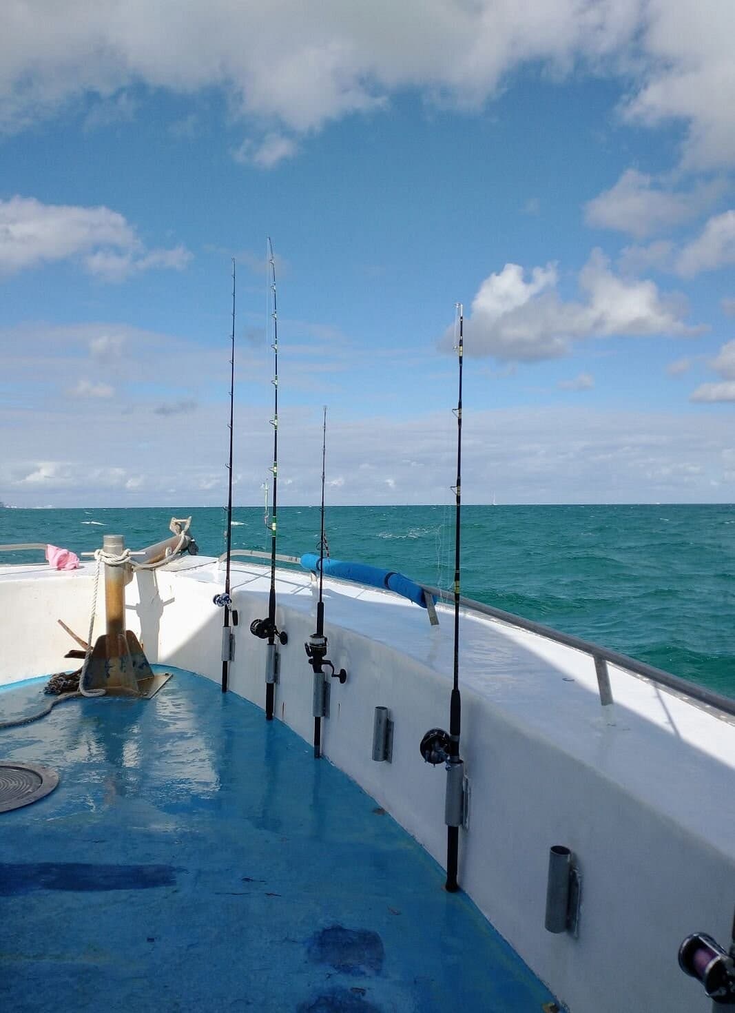 Fishing rods on a boat at Kelley Fishing Fleet, Bal Harbour