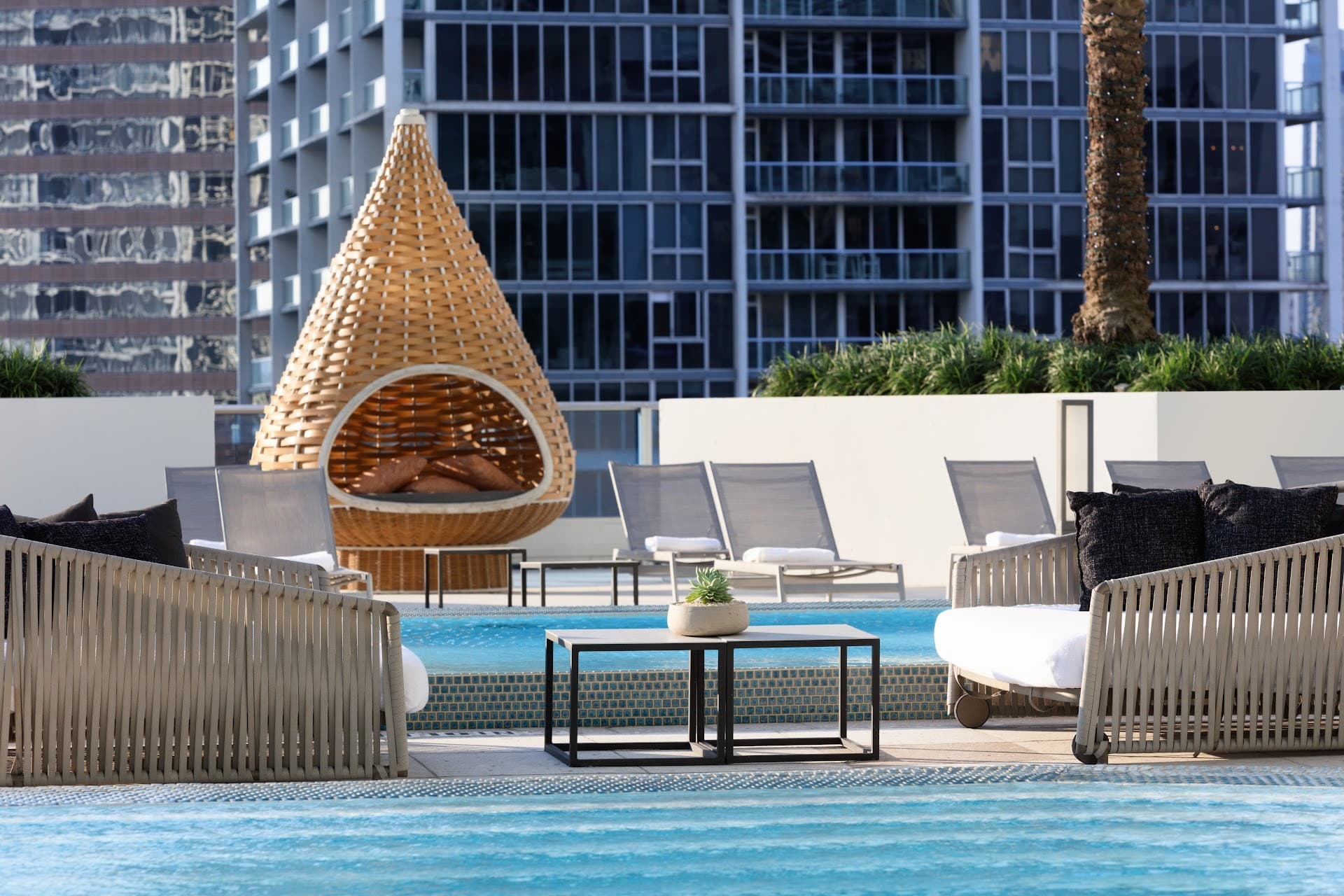 Stylish pool area at Kimpton EPIC Hotel Miami