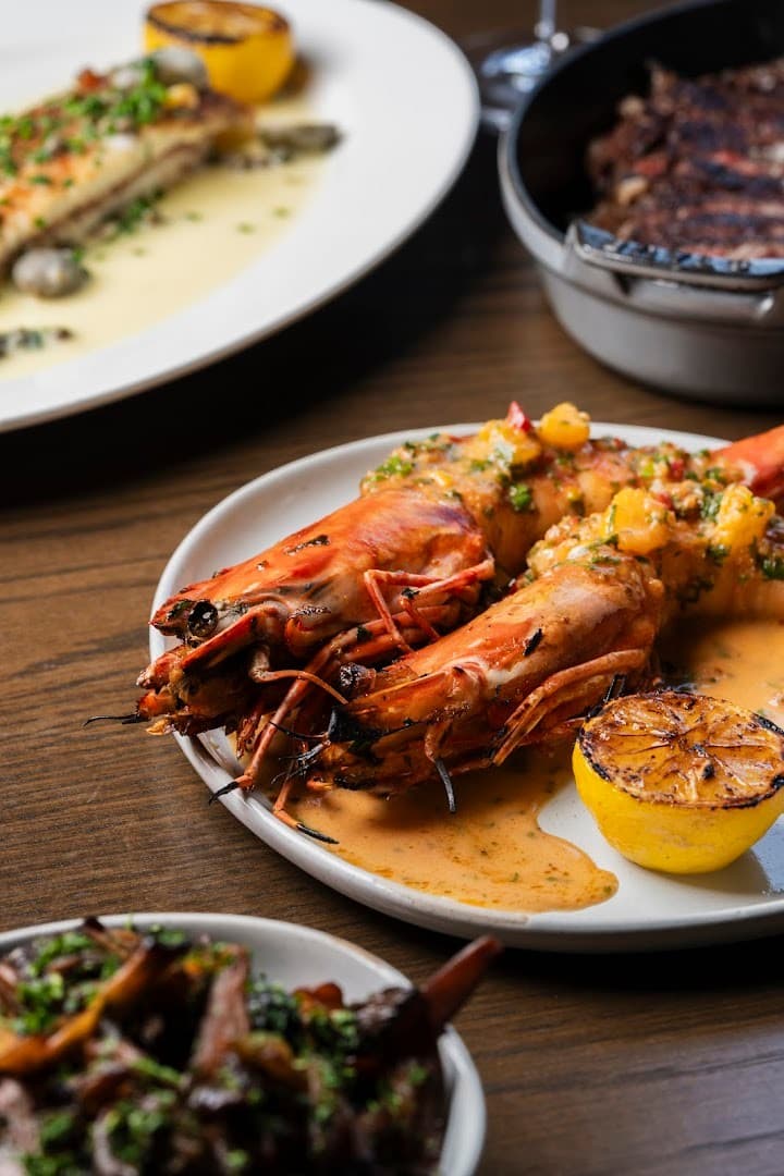 Grilled prawns with sauce at Klaw Miami