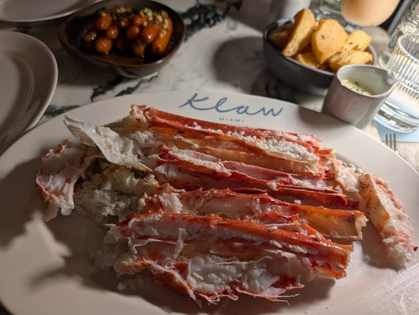Klaw Miami crab dish served elegantly