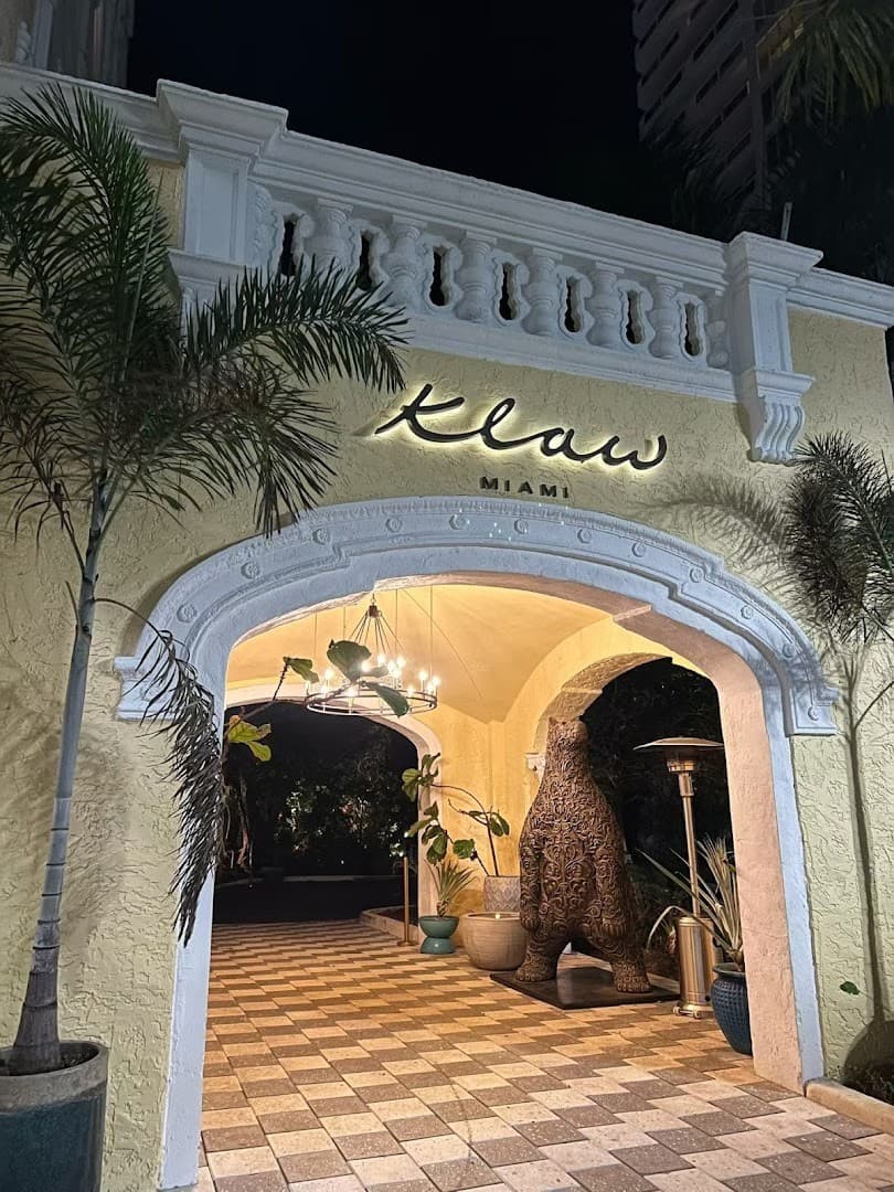 Klaw Miami restaurant entrance at night