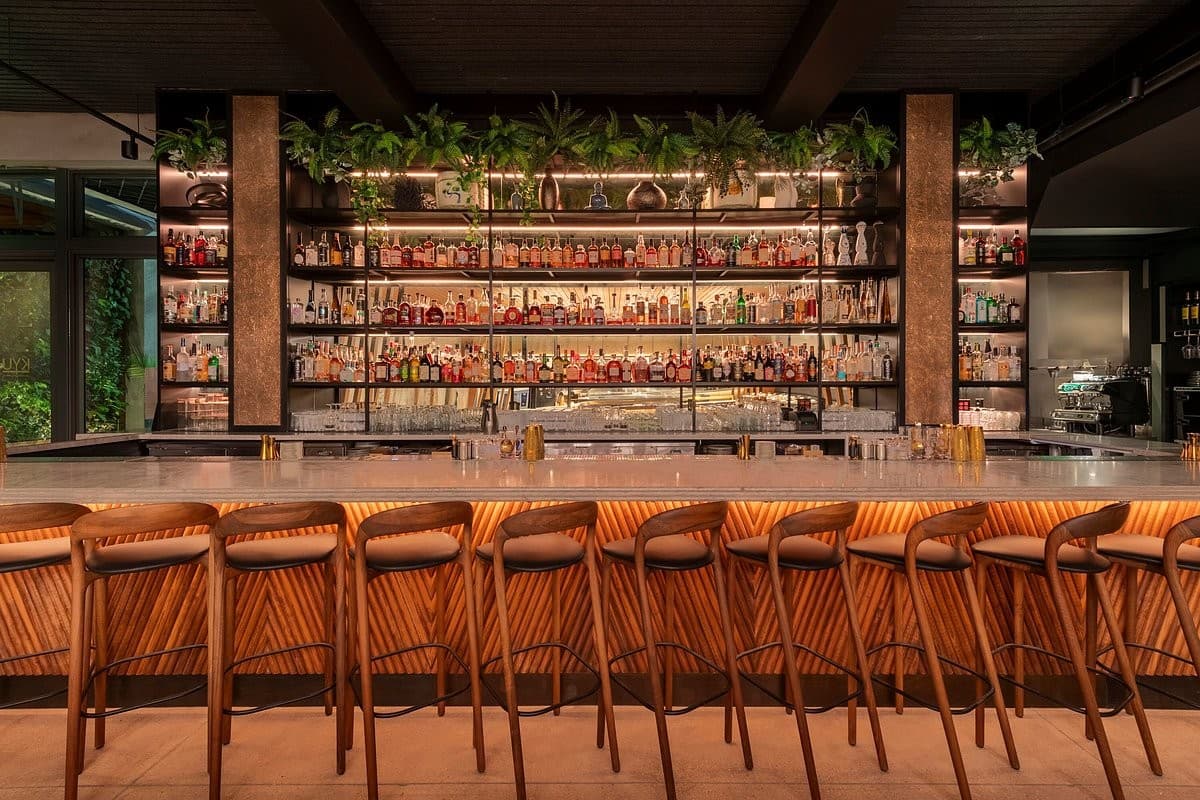 Stylish bar interior at KYU Miami