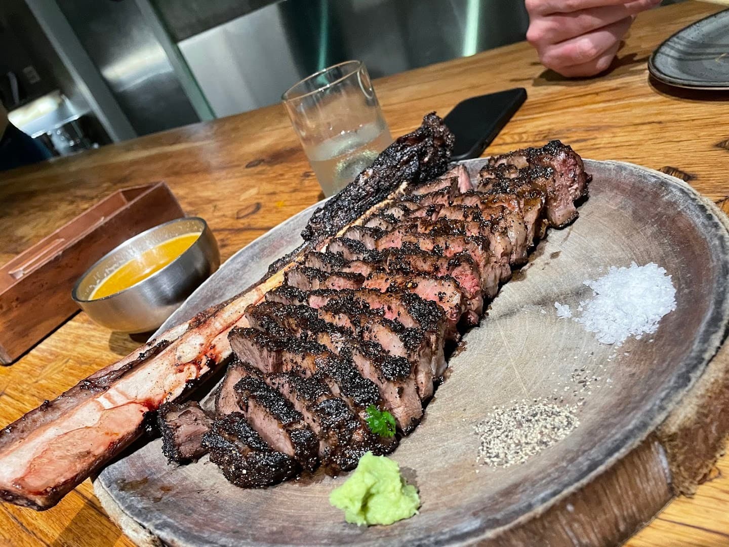 Grilled steak dish at KYU Miami