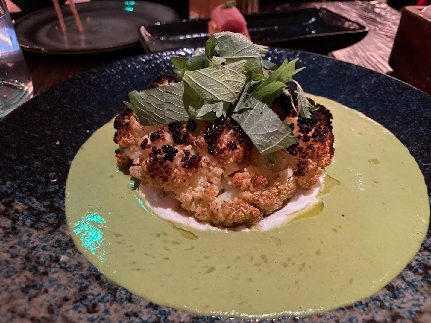 Grilled cauliflower dish at KYU Miami