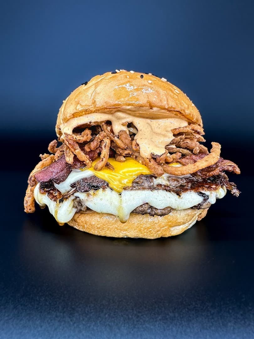 La Birra Bar burger with toppings in Wynwood, Miami