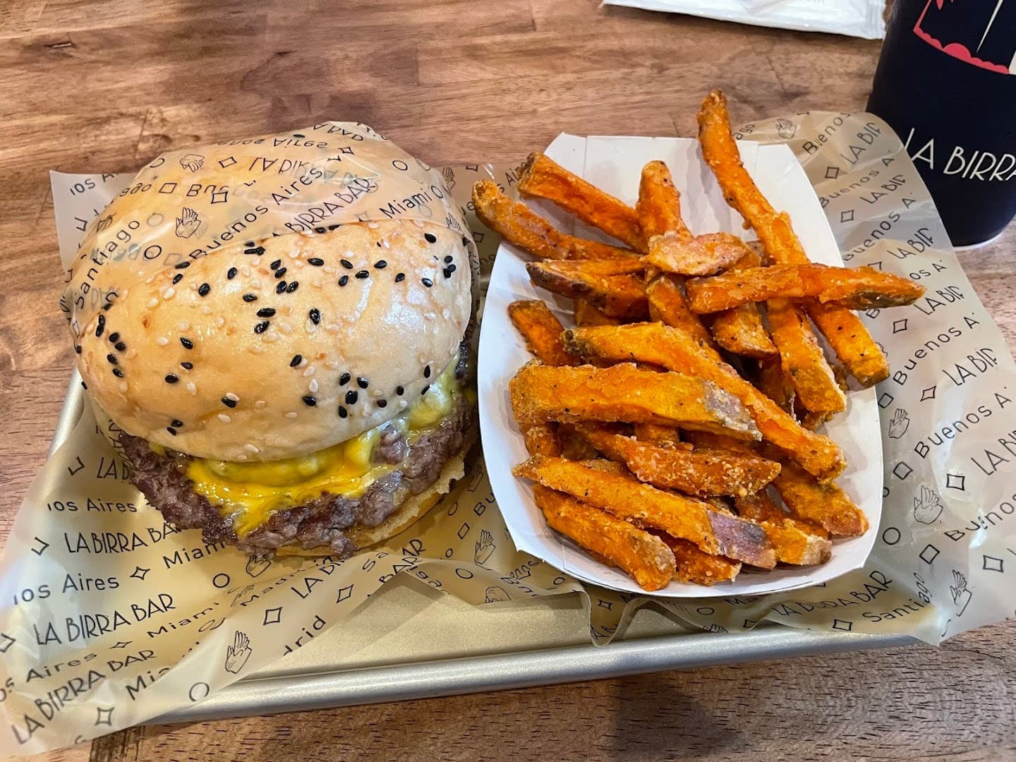 Delicious burger and sweet potato fries at La Birra Bar in Miami