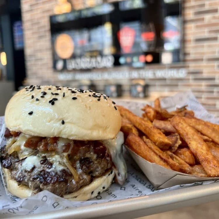 Delicious burger and sweet potato fries at La Birra Bar in Miami