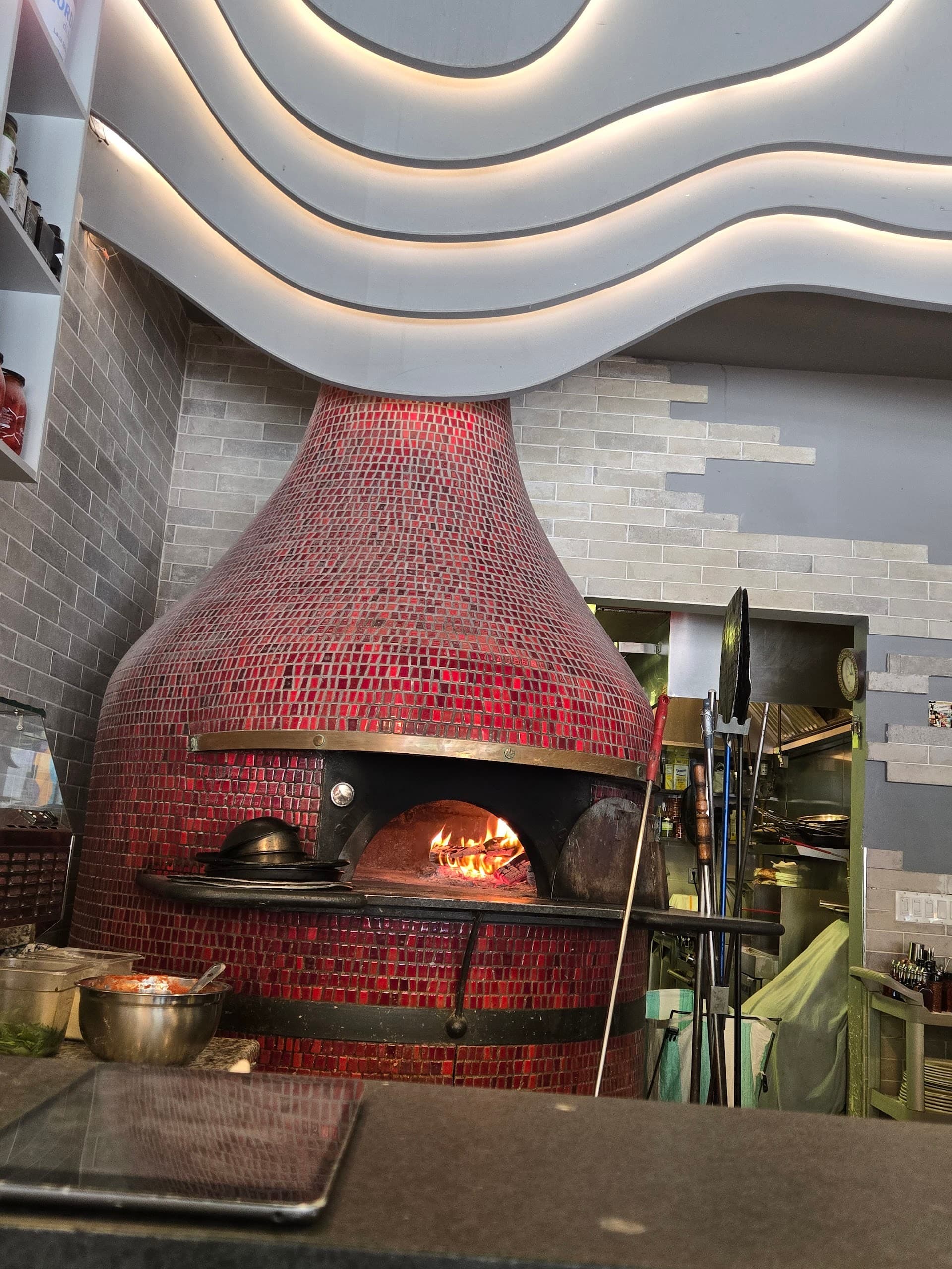 La Leggenda Pizzeria interior with wood-fired oven in Miami Beach