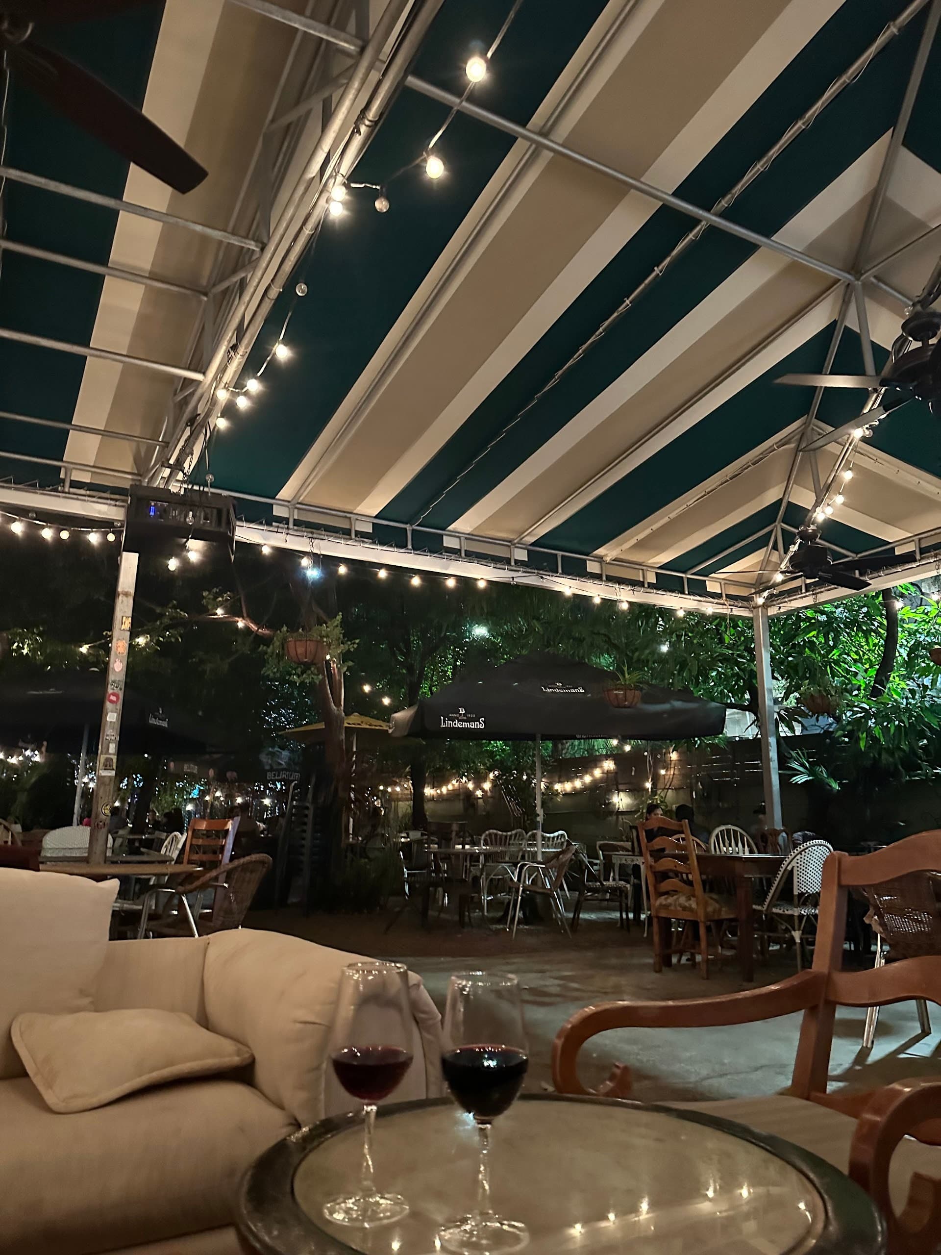 Lagniappe ambiance at night, Miami outdoor seating