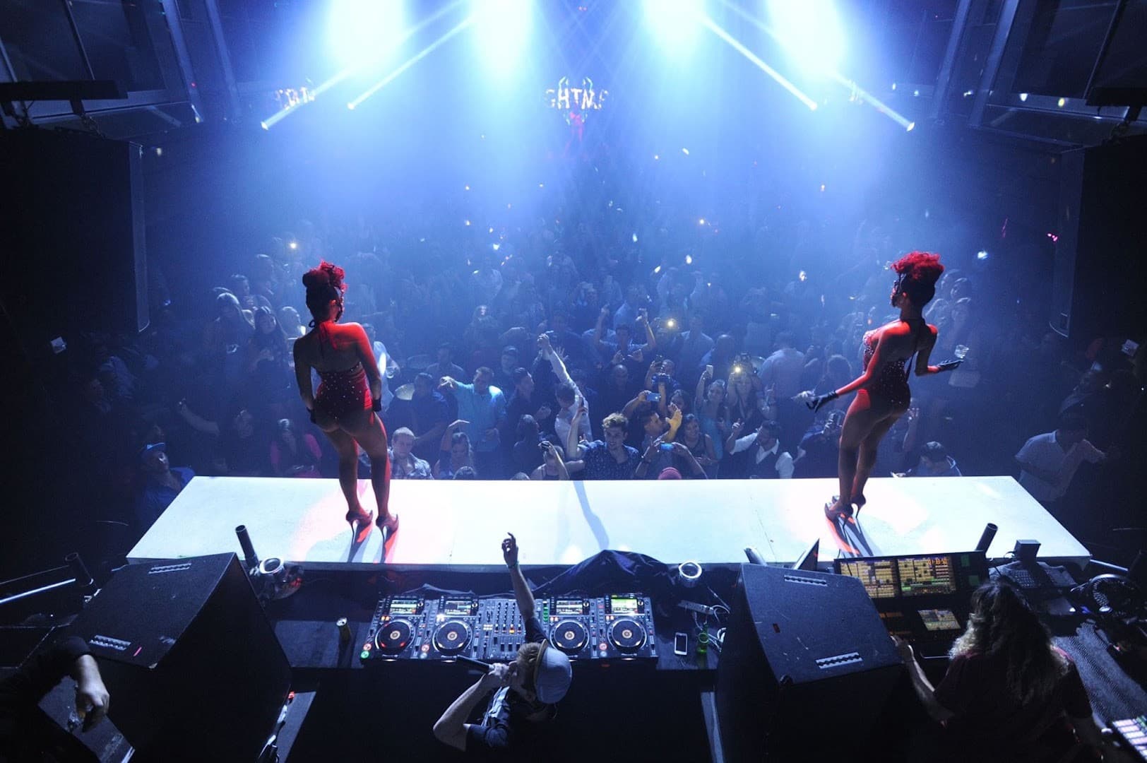 LIV Nightclub Miami Beach vibrant DJ stage atmosphere
