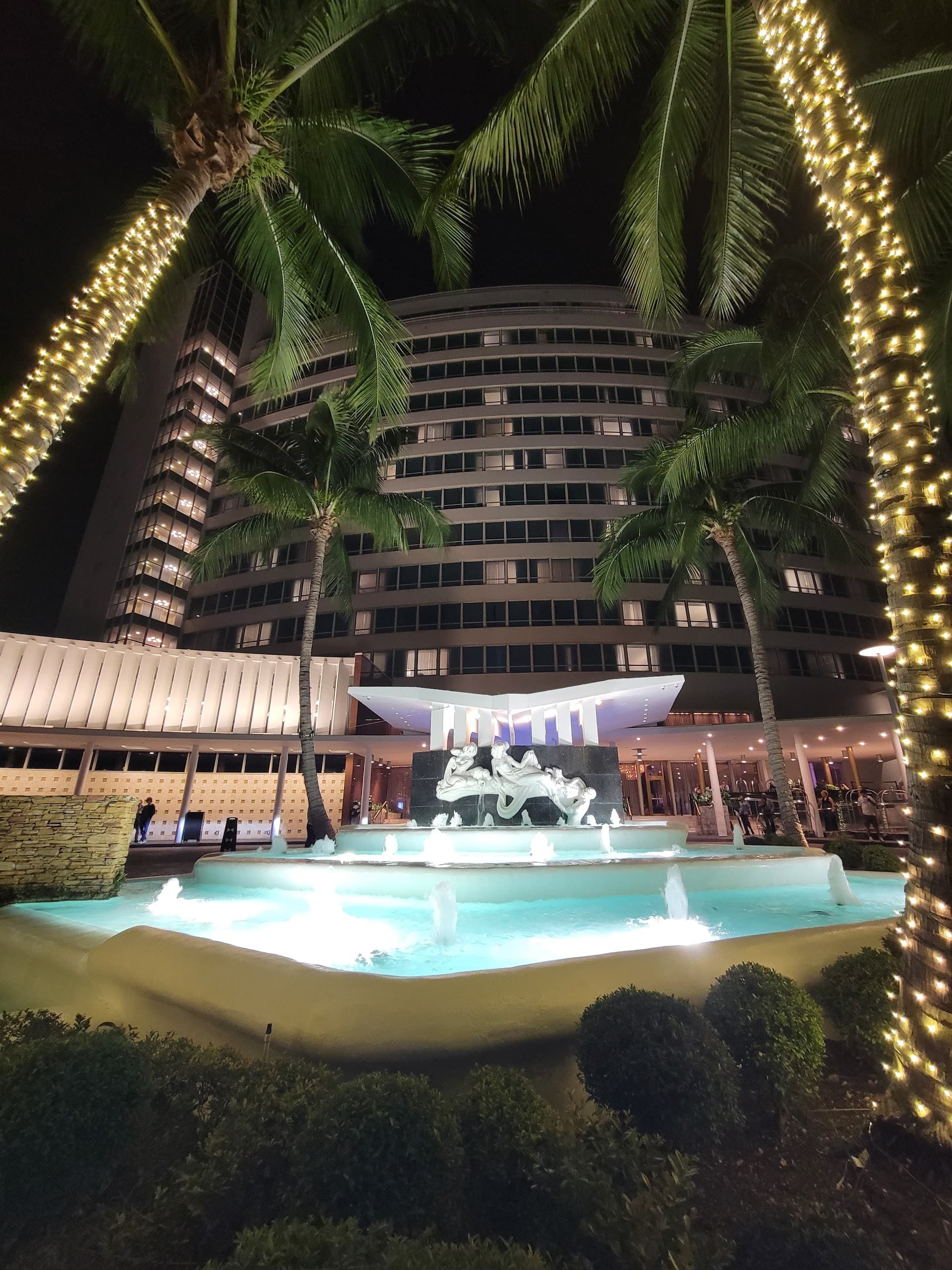 LIV Nightclub Miami exterior at night with palm trees