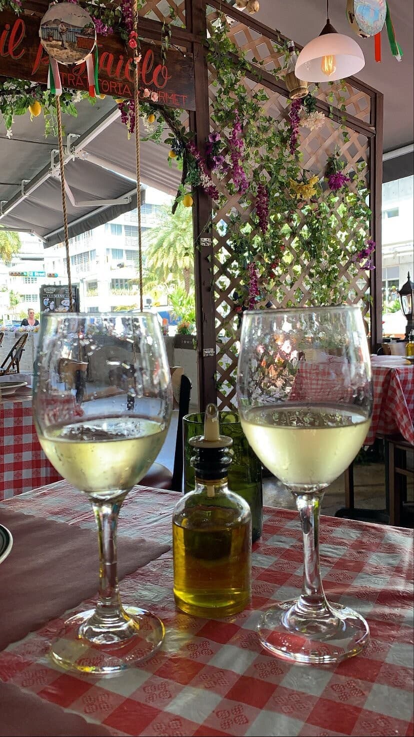 Interior view of ll Pastaiolo in Miami Beach with wine