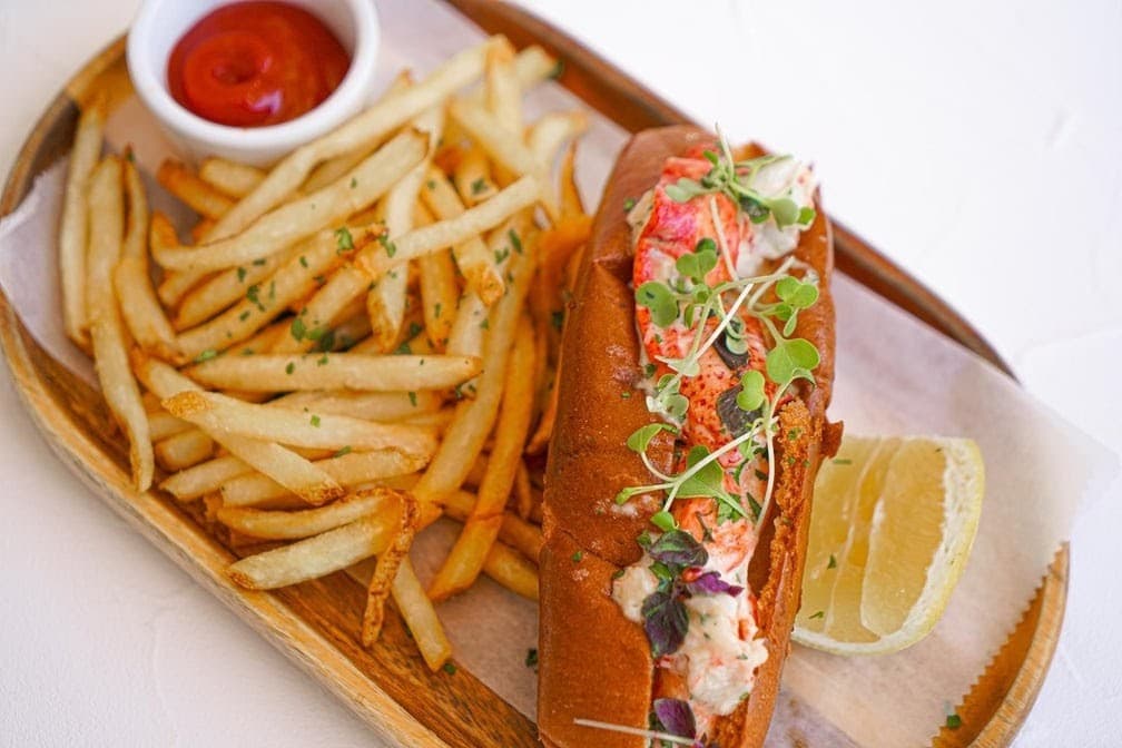 Lobster roll and fries at Local House Miami Beach