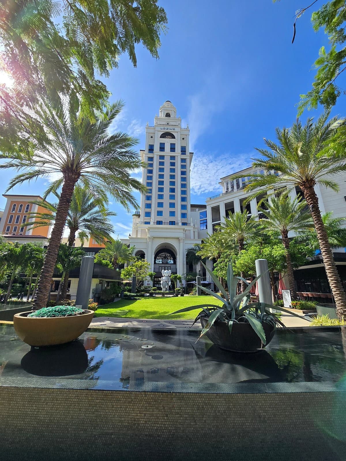 Loews Coral Gables Hotel exterior view with palm trees
