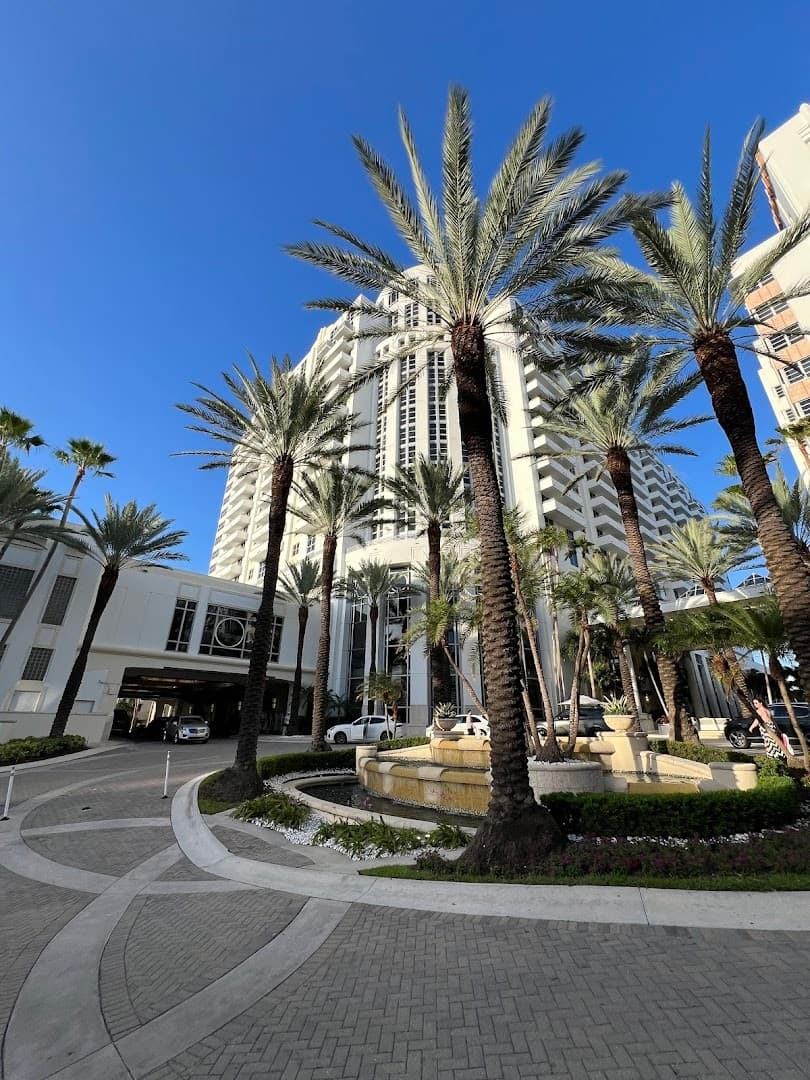 Loews Miami Beach Hotel exterior view with palm trees