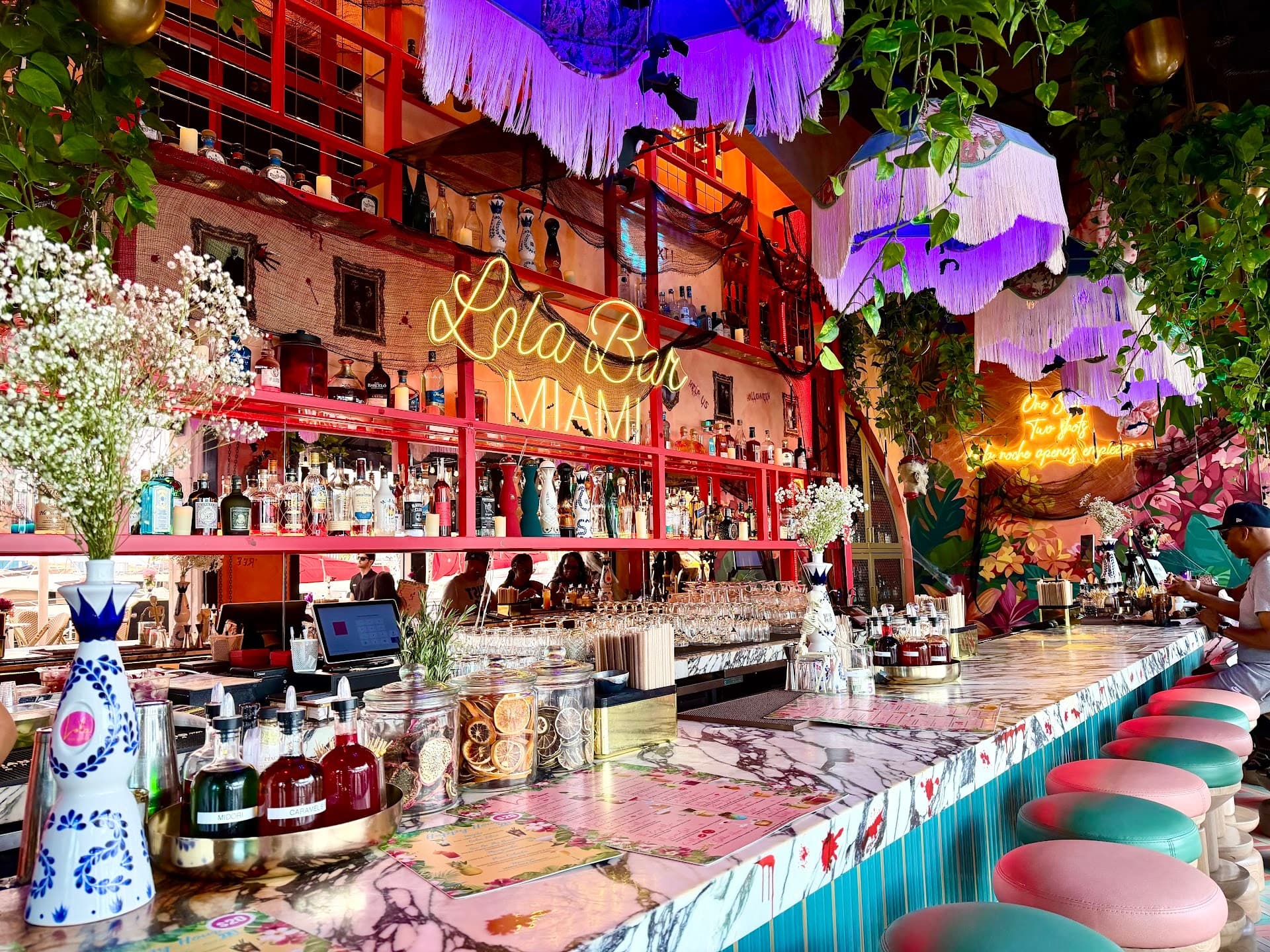 Lola bar interior in Miami with vibrant decor