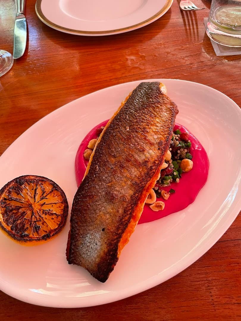 Grilled fish dish at Los Fuegos by Francis Mallmann in Miami Beach