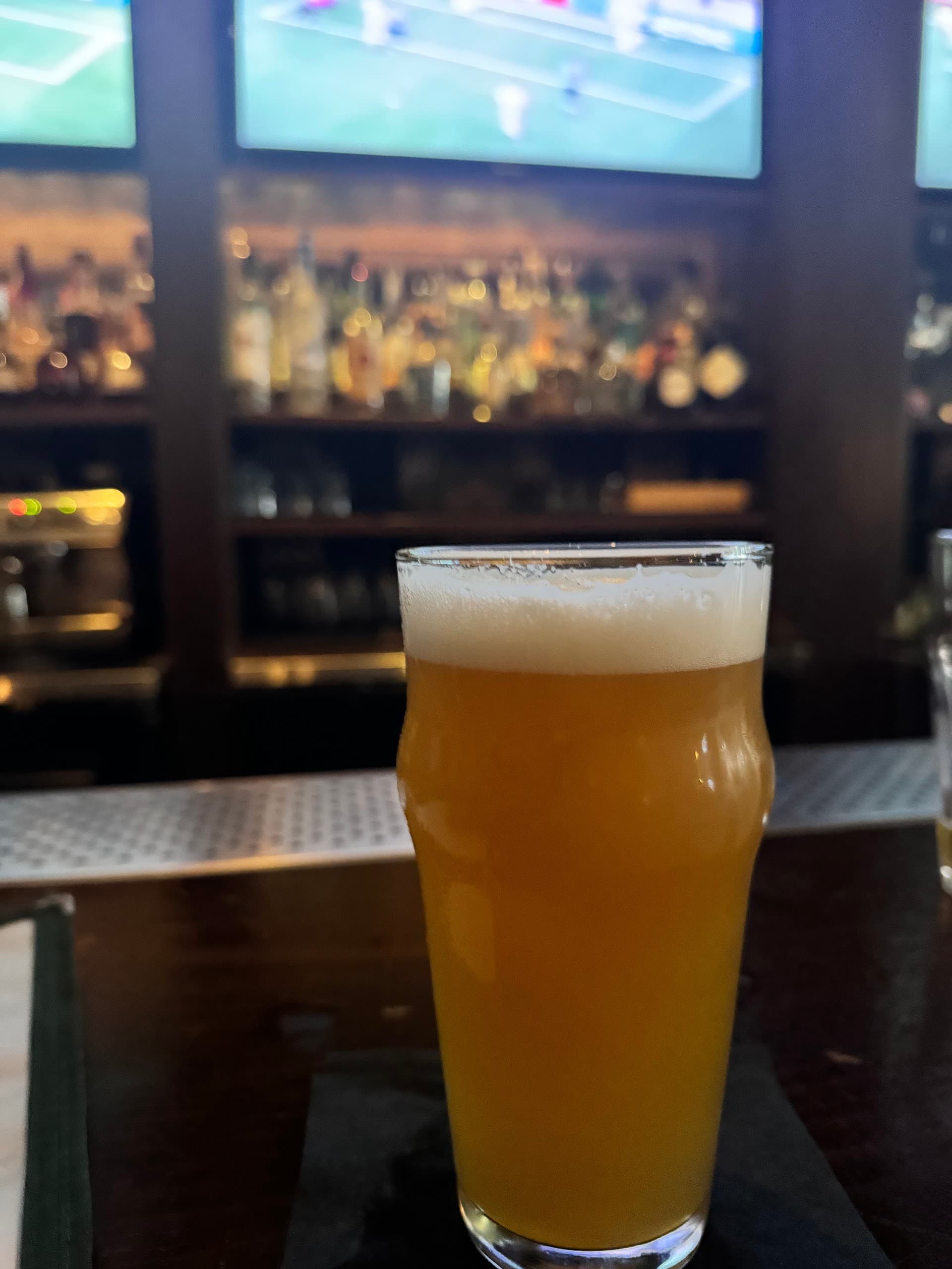 Lost Boy Dry Goods bar scene with beer in Miami