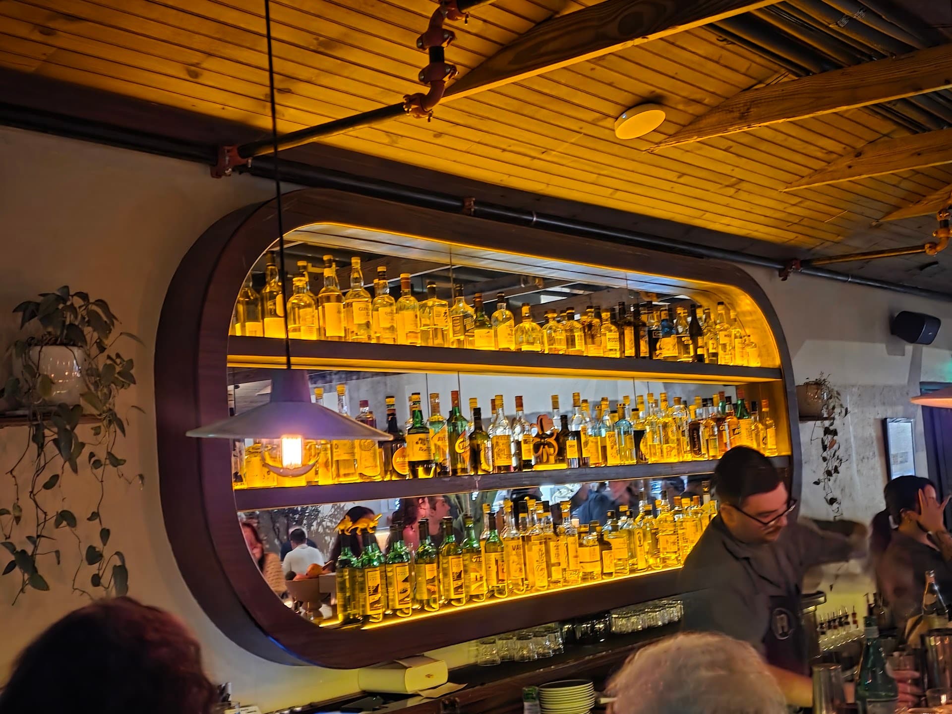 Bar at Macchialina in Miami Beach with illuminated shelves