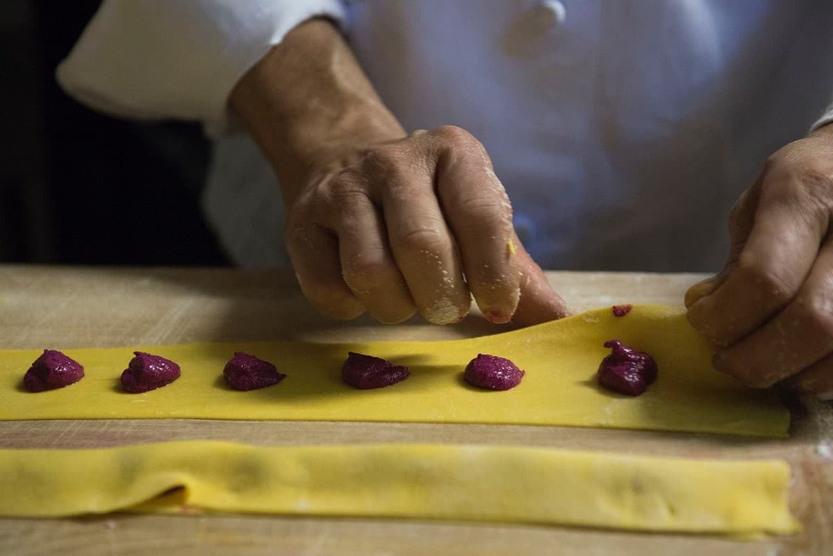 Chef preparing pasta at Macchialina in Miami Beach