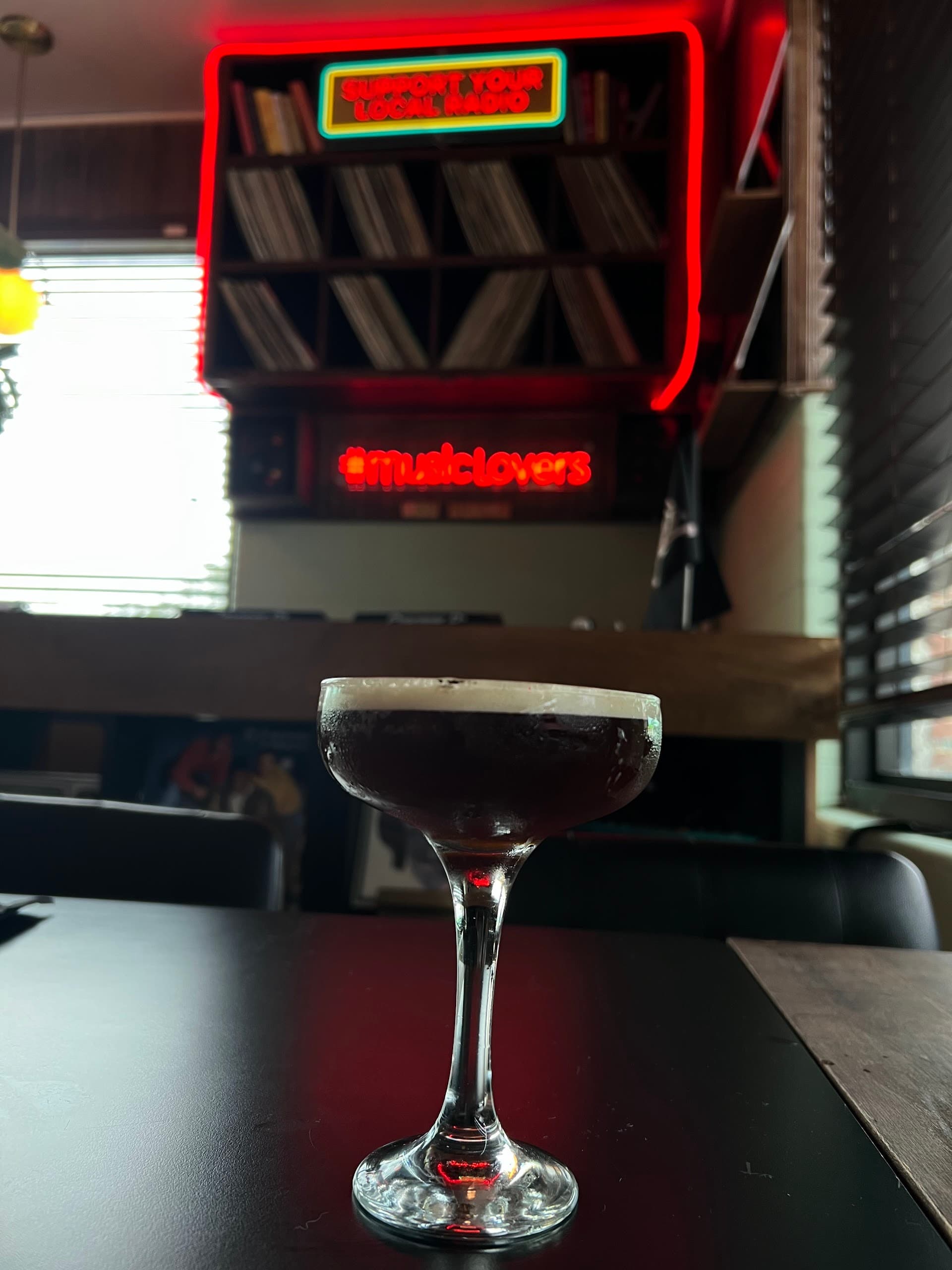 Cocktail at Mad Radio Miami bar, vibrant nightlife
