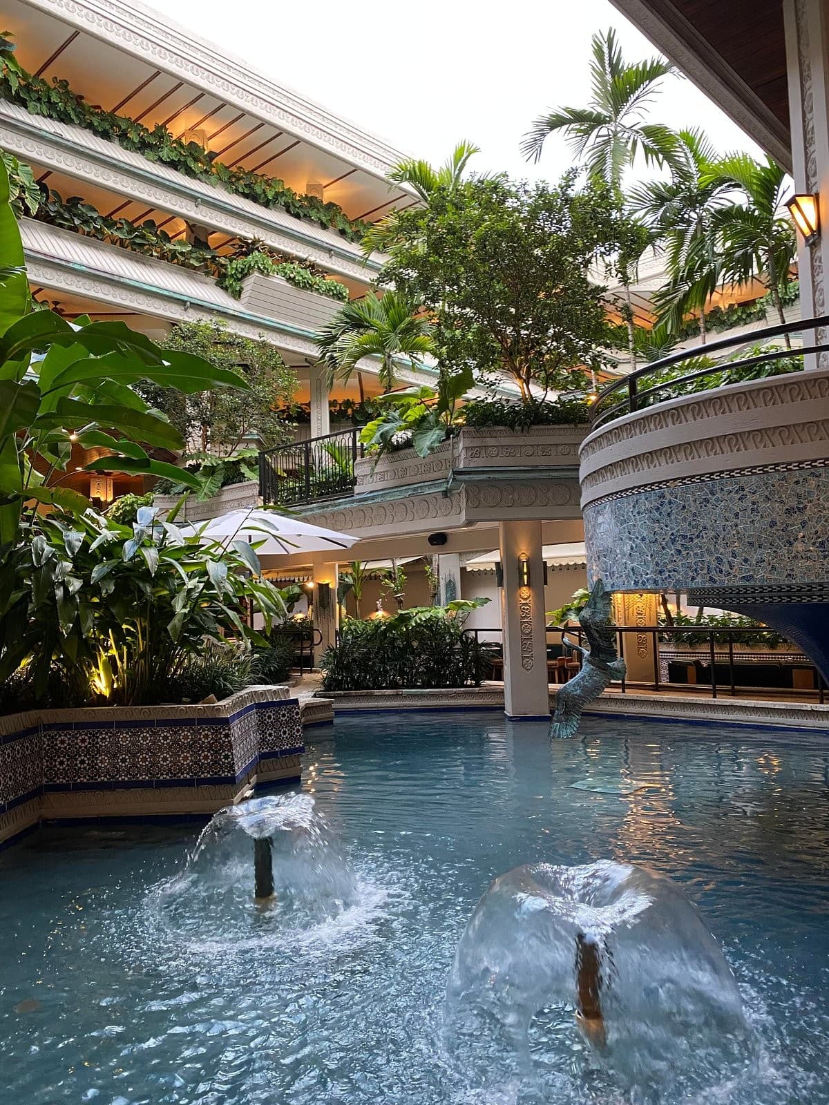 Mayfair Grill interior with lush greenery in Miami
