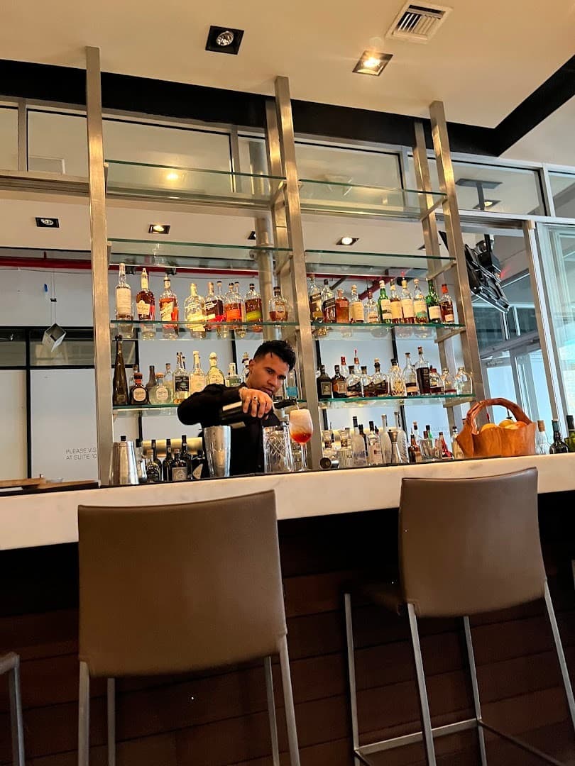 Bartender preparing drinks at MC Kitchen in Miami