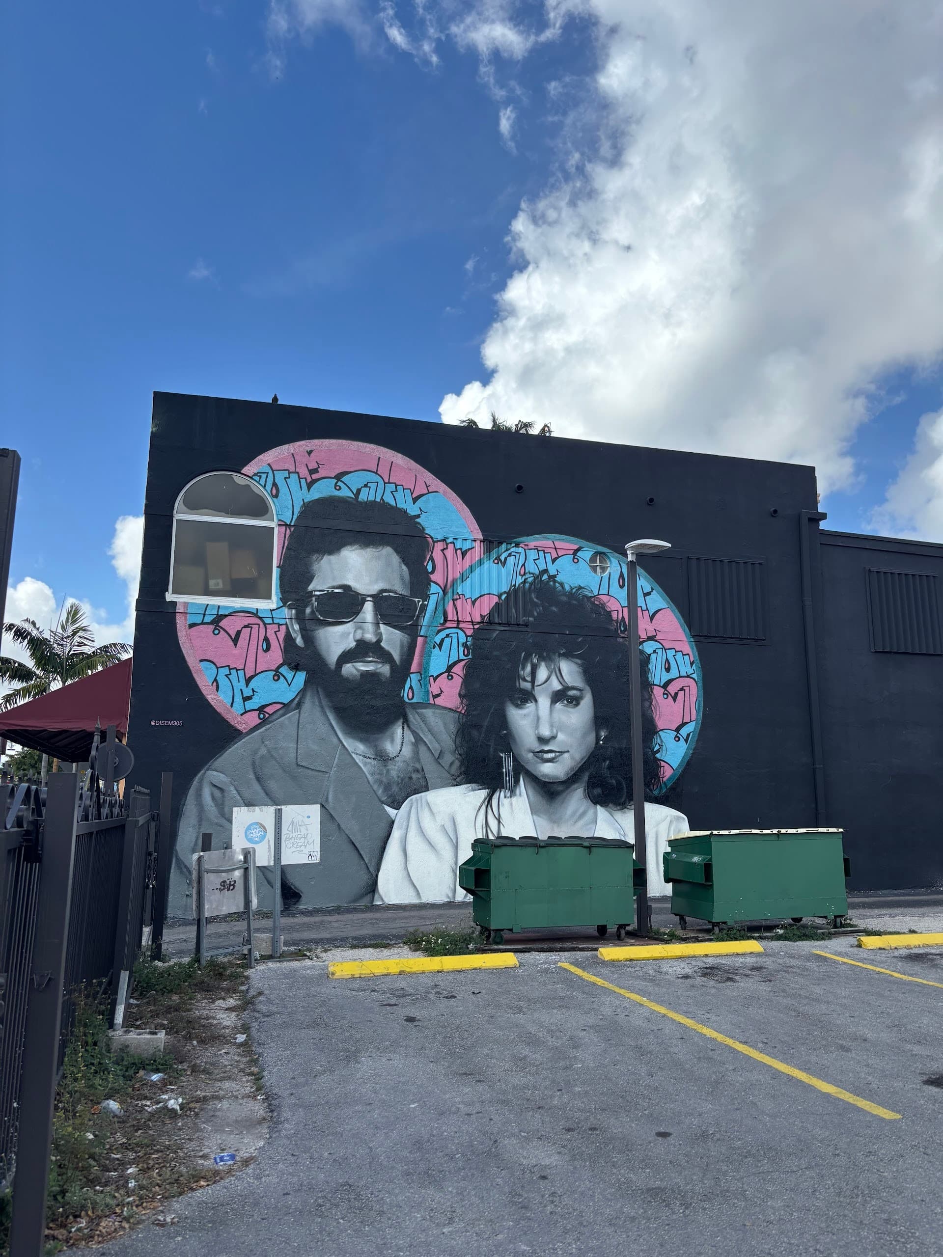 Mural artwork in Miami Beach featuring two figures