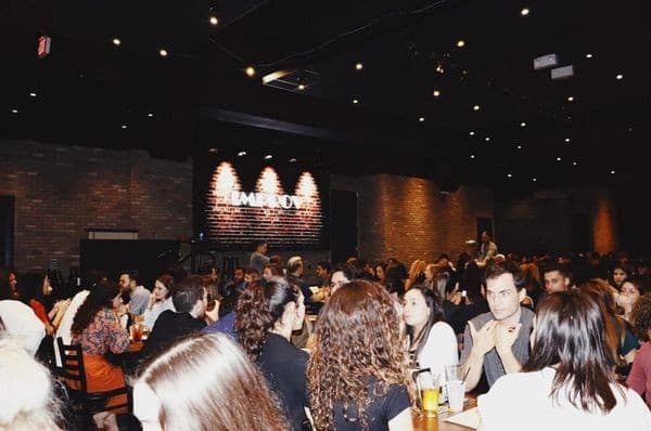 Crowded dining scene at Miami Improv Comedy Club in Doral