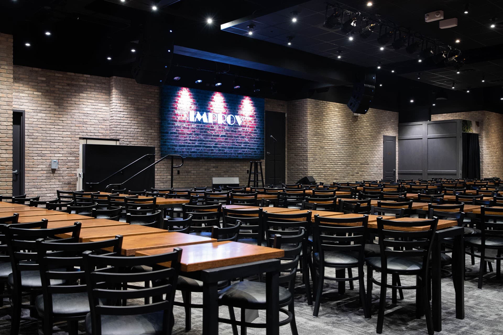 Miami Improv Comedy Club interior with seating in Doral