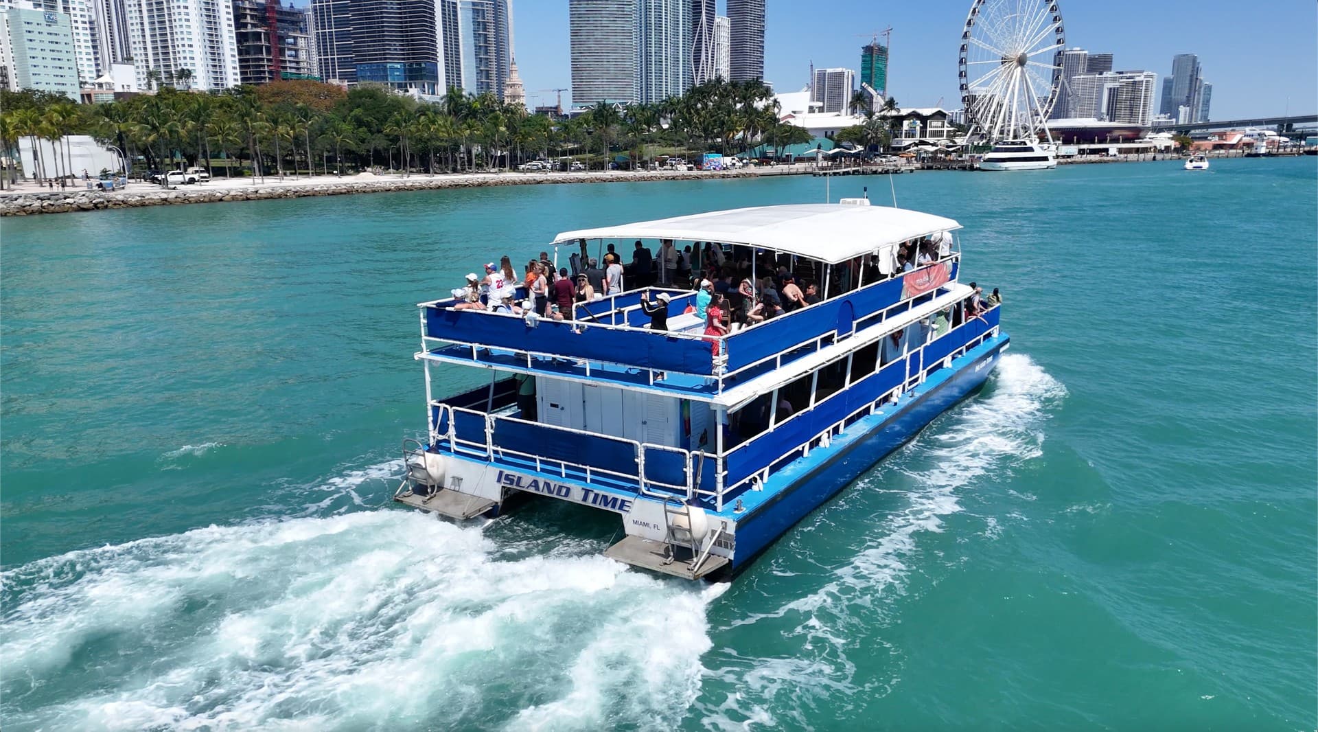 Island Time cruise boat in Miami skyline