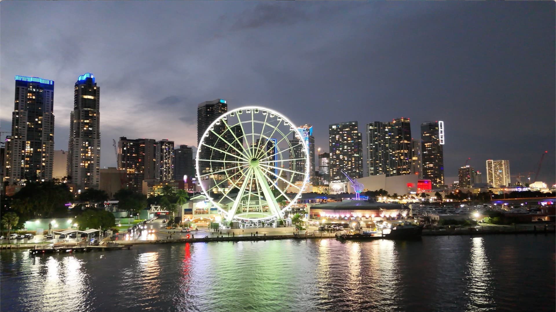 Miami skyline with Ferris wheel at night