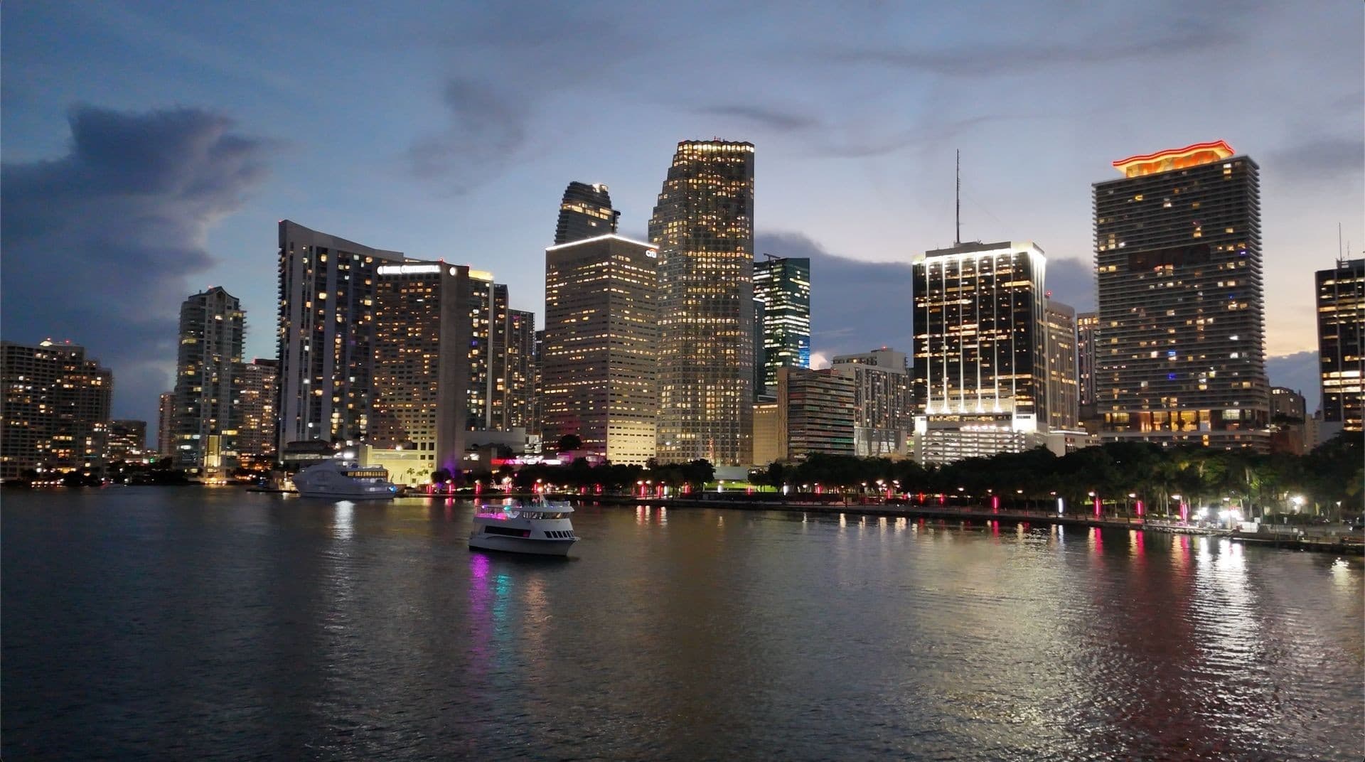 Miami skyline at dusk with skyline cruises