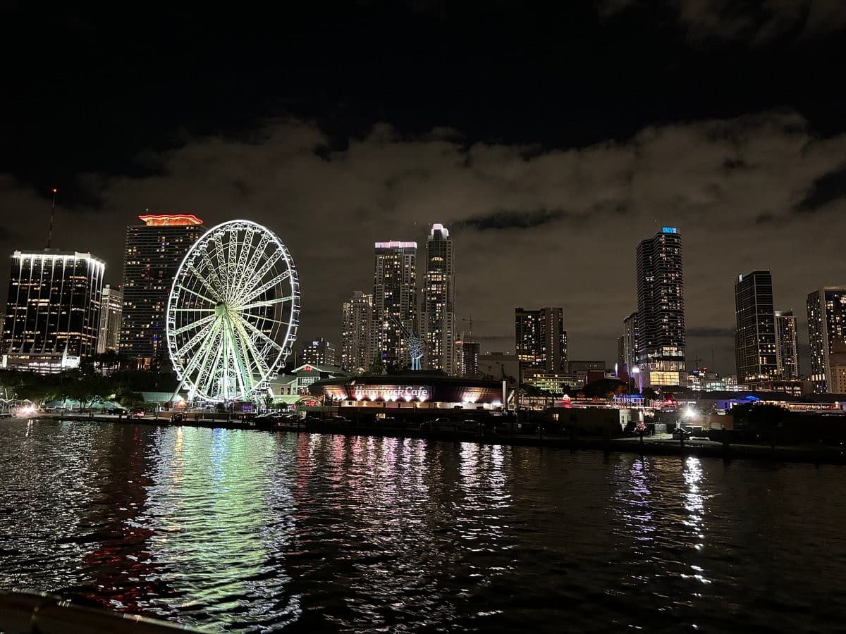 Miami Yacht Adventures night view with skyline