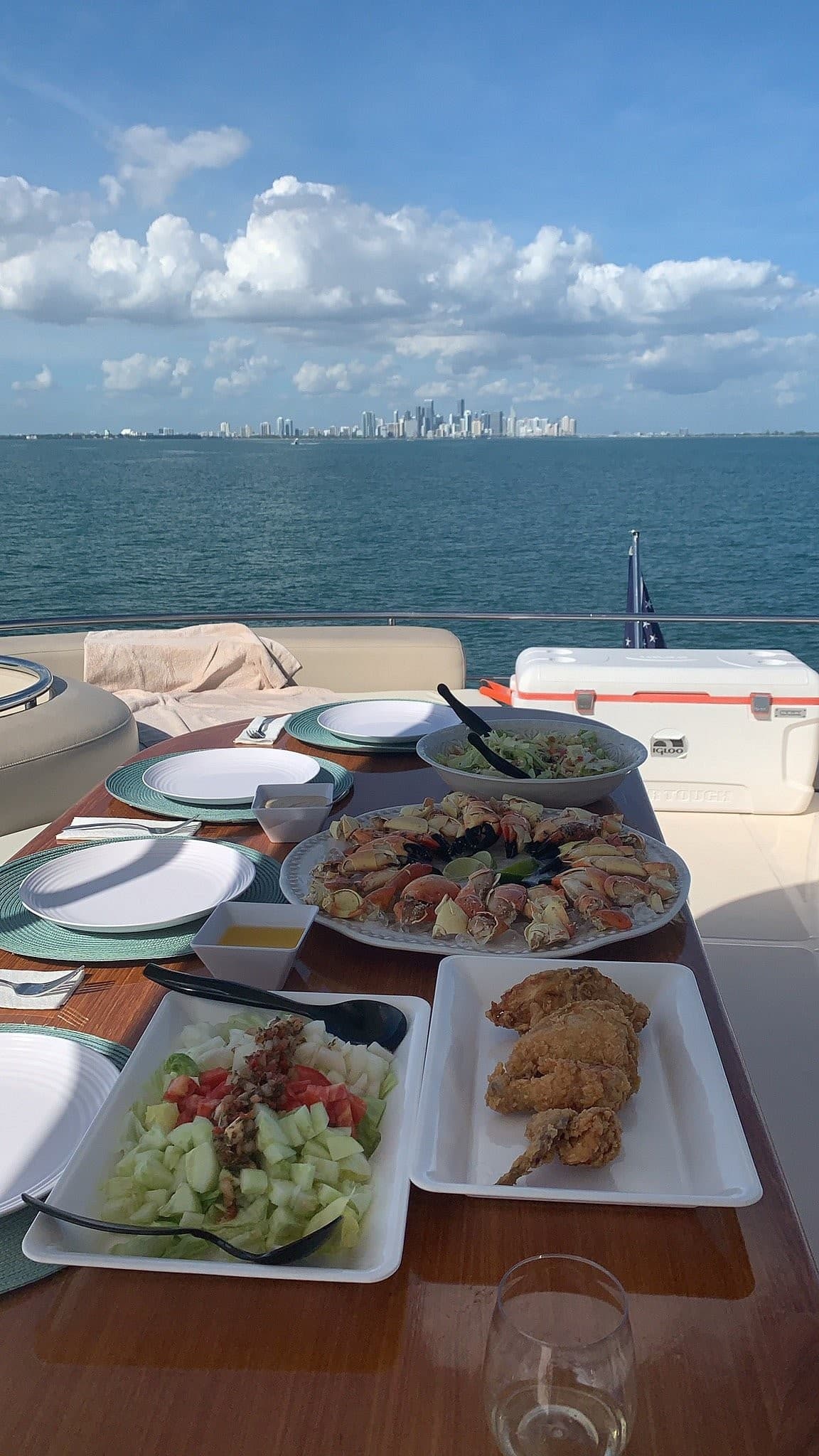 Dining on a yacht with Miami skyline view