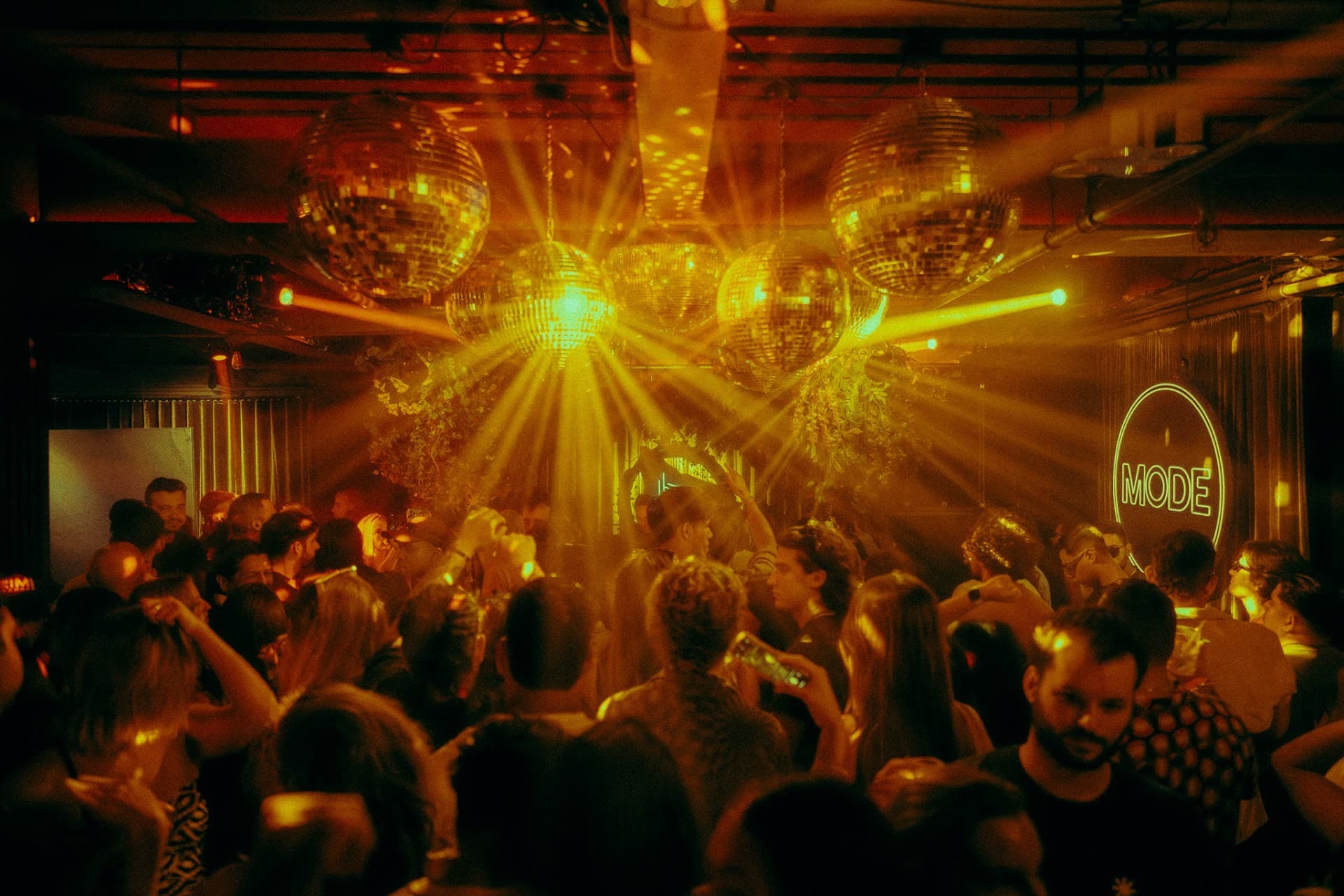 Crowd dancing at MODE Downtown Miami nightlife venue