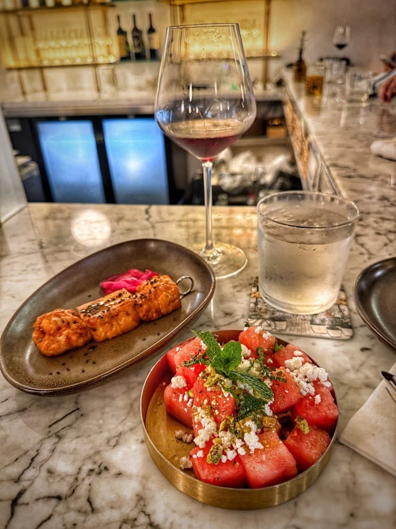 Watermelon salad and skewers at Motek Miami Beach